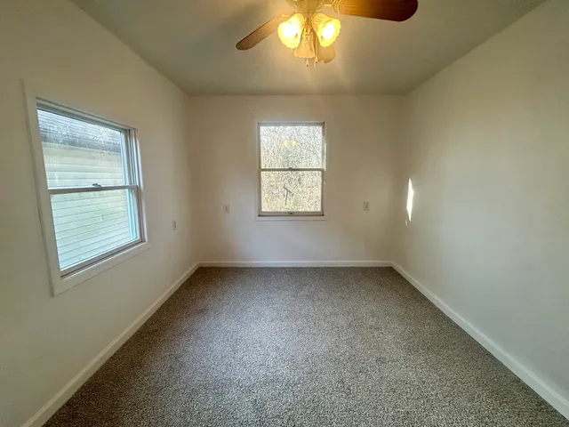 an empty room with a window