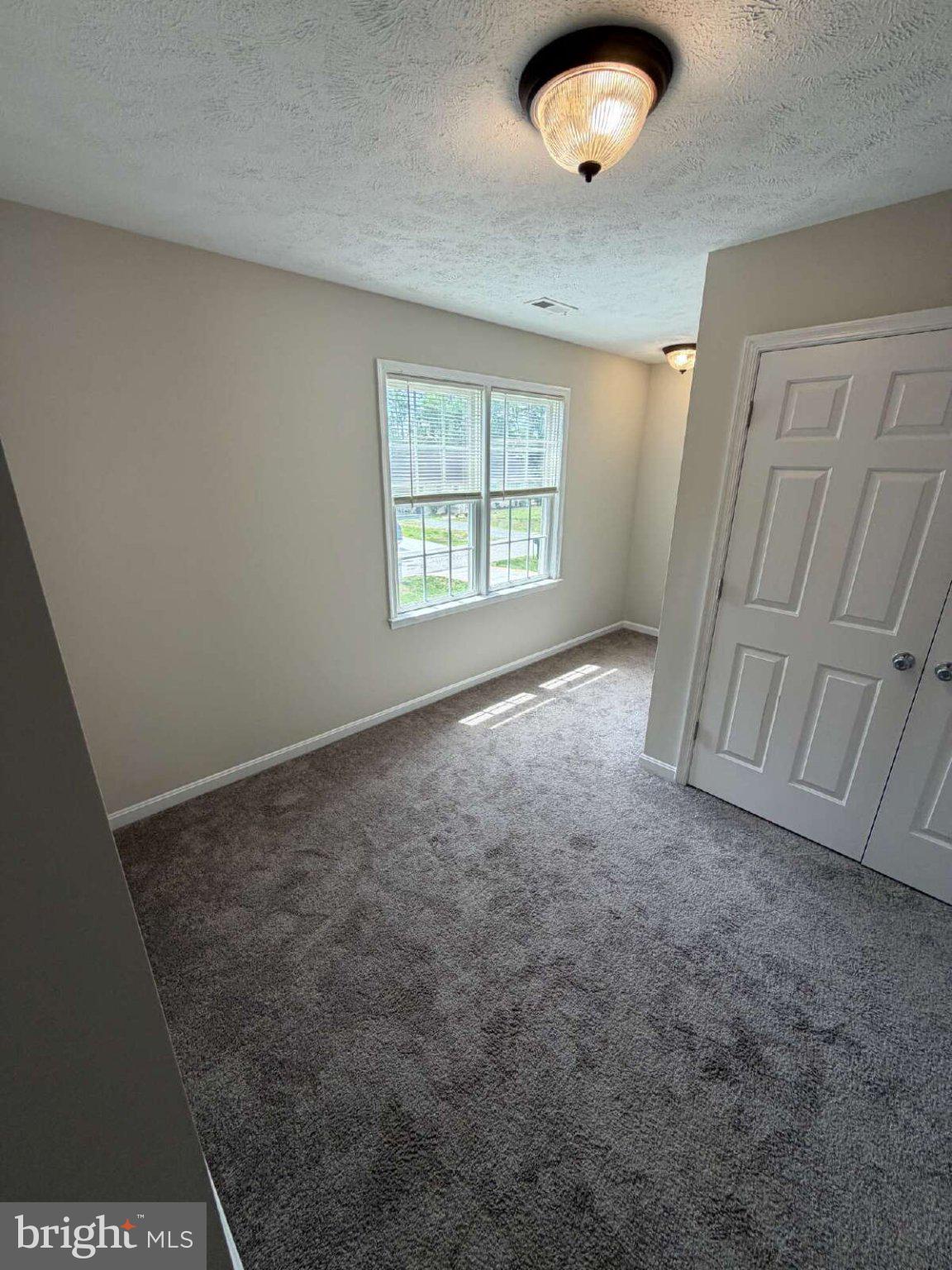 313 3rd Street Colonial Beach, VA 22443 - Photo 19 of 36 Bright and airy room with natural light.
