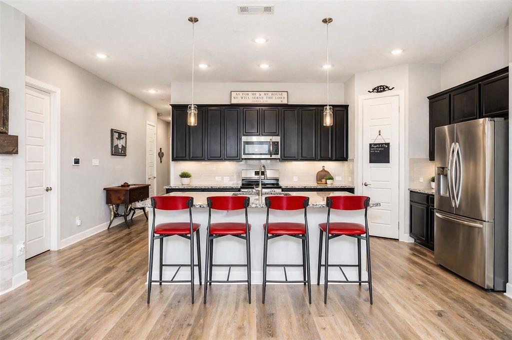 709 Bent Brook Road Oak Point, TX 75068 - Photo 3 of 24 Large Kitchen with Plenty of seating