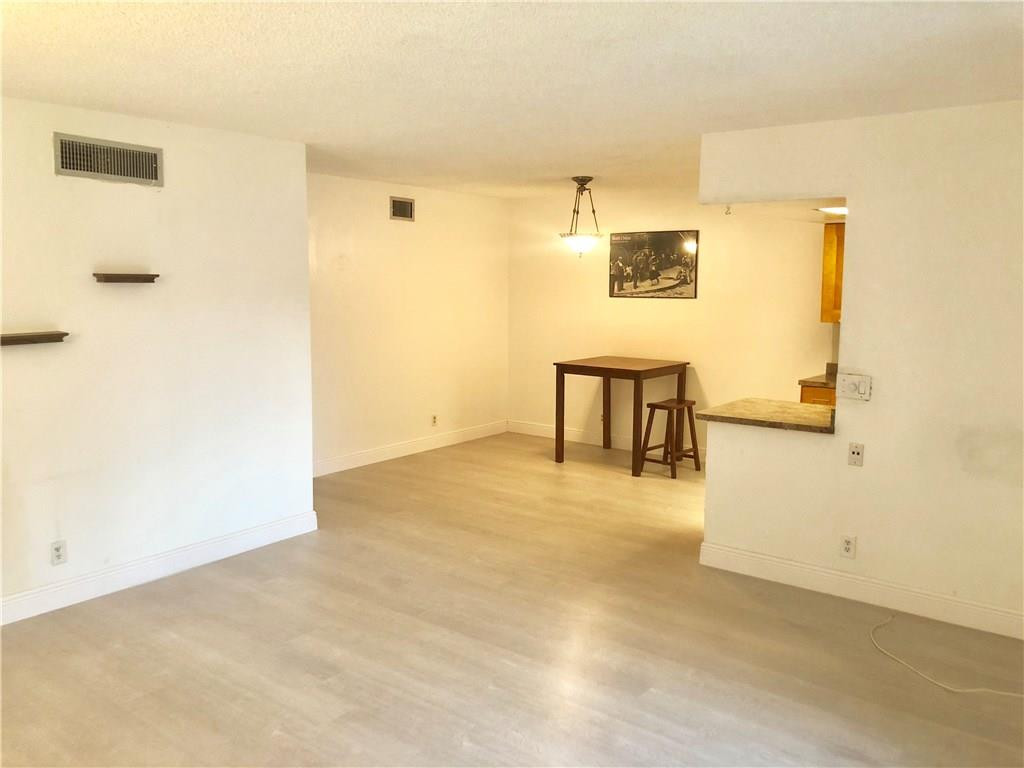 8400 West Sample Road, Unit 204 Coral Springs, FL 33065 - Photo 4 of 16 Brand New Flooring.