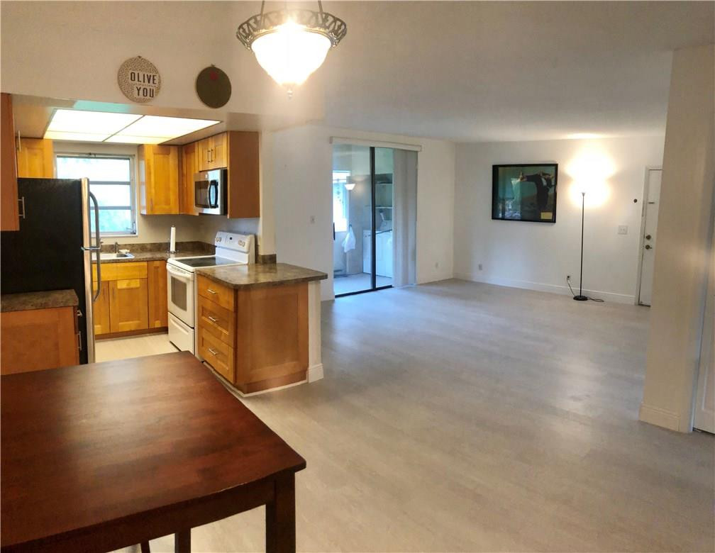 8400 West Sample Road, Unit 204 Coral Springs, FL 33065 - Photo 16 of 16 Open Floor Plan.