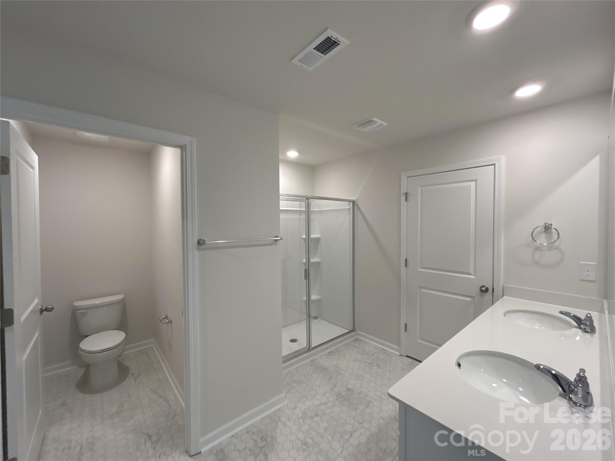 1920 Vanderlyn Street Monroe, NC 28112 - Photo 15 of 24 a bathroom with a sink and a mirror