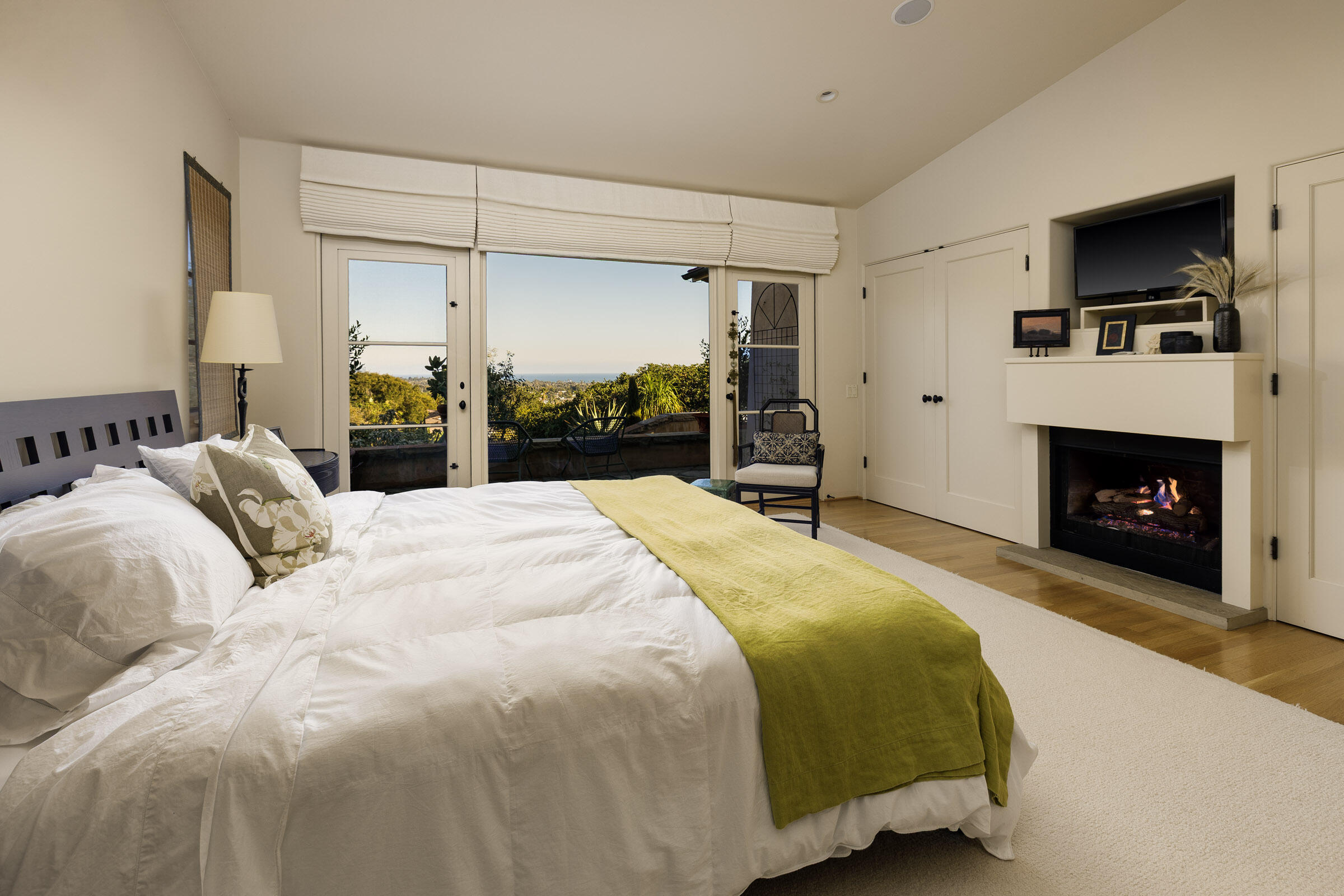 1022 Garcia Road Santa Barbara, CA 93103 - Photo 13 of 29 a bedroom with a bed and a fireplace