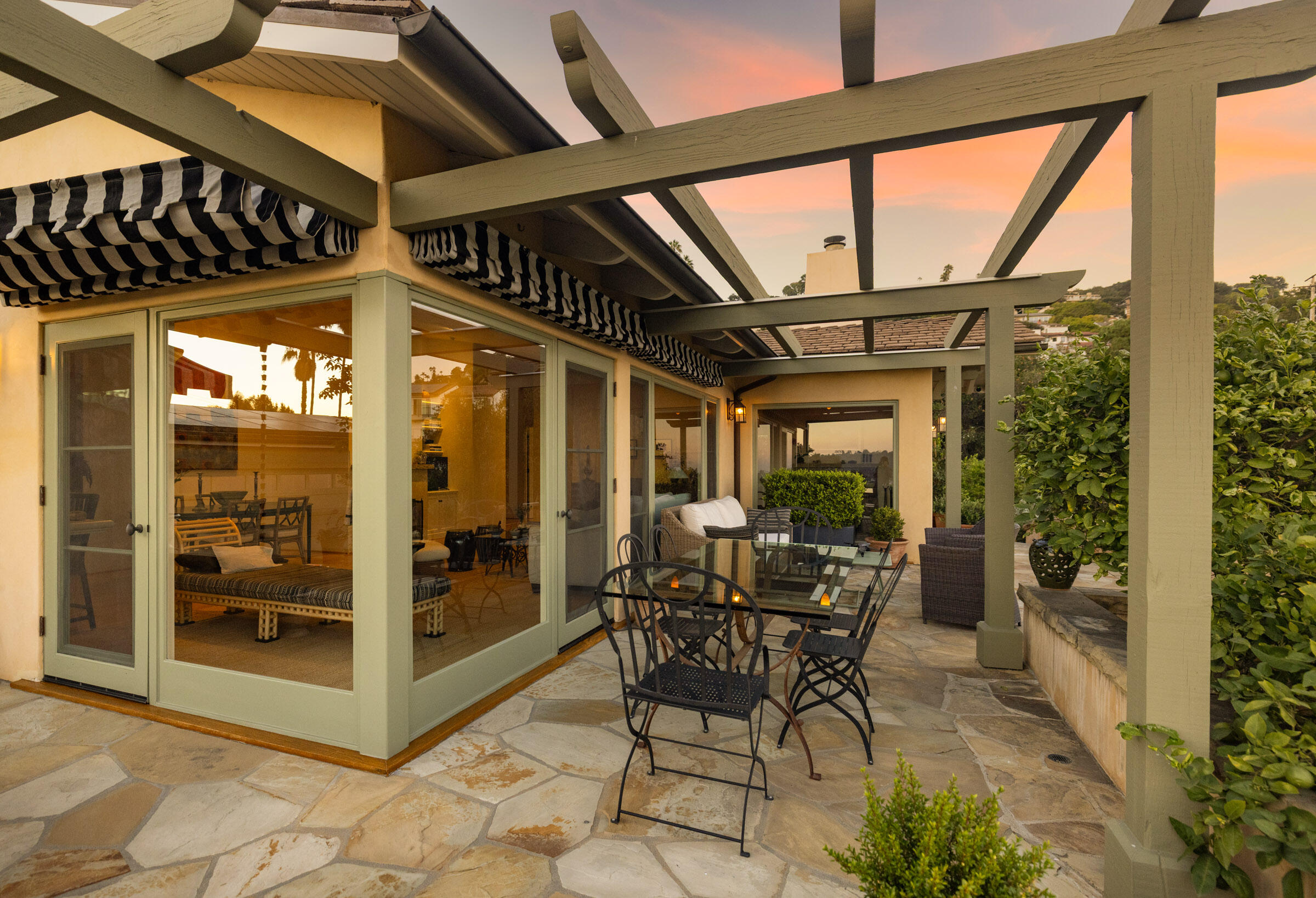 1022 Garcia Road Santa Barbara, CA 93103 - Photo 7 of 29 a patio with table and chairs and potted plants