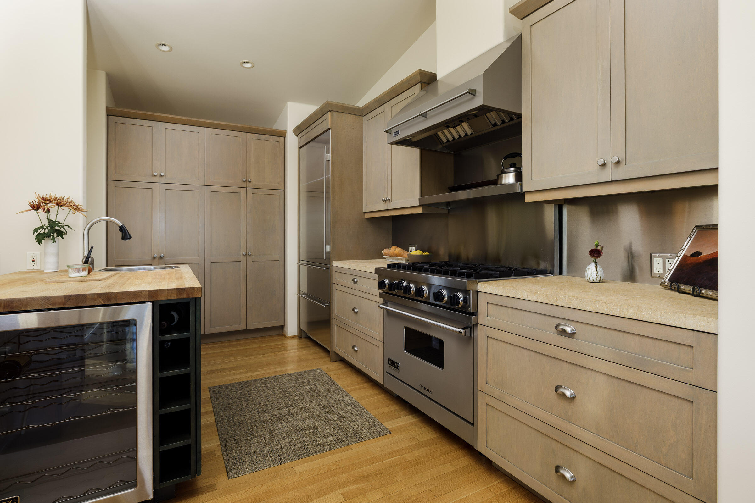 1022 Garcia Road Santa Barbara, CA 93103 - Photo 9 of 29 a kitchen with stainless steel appliances granite countertop a stove and a refrigerator
