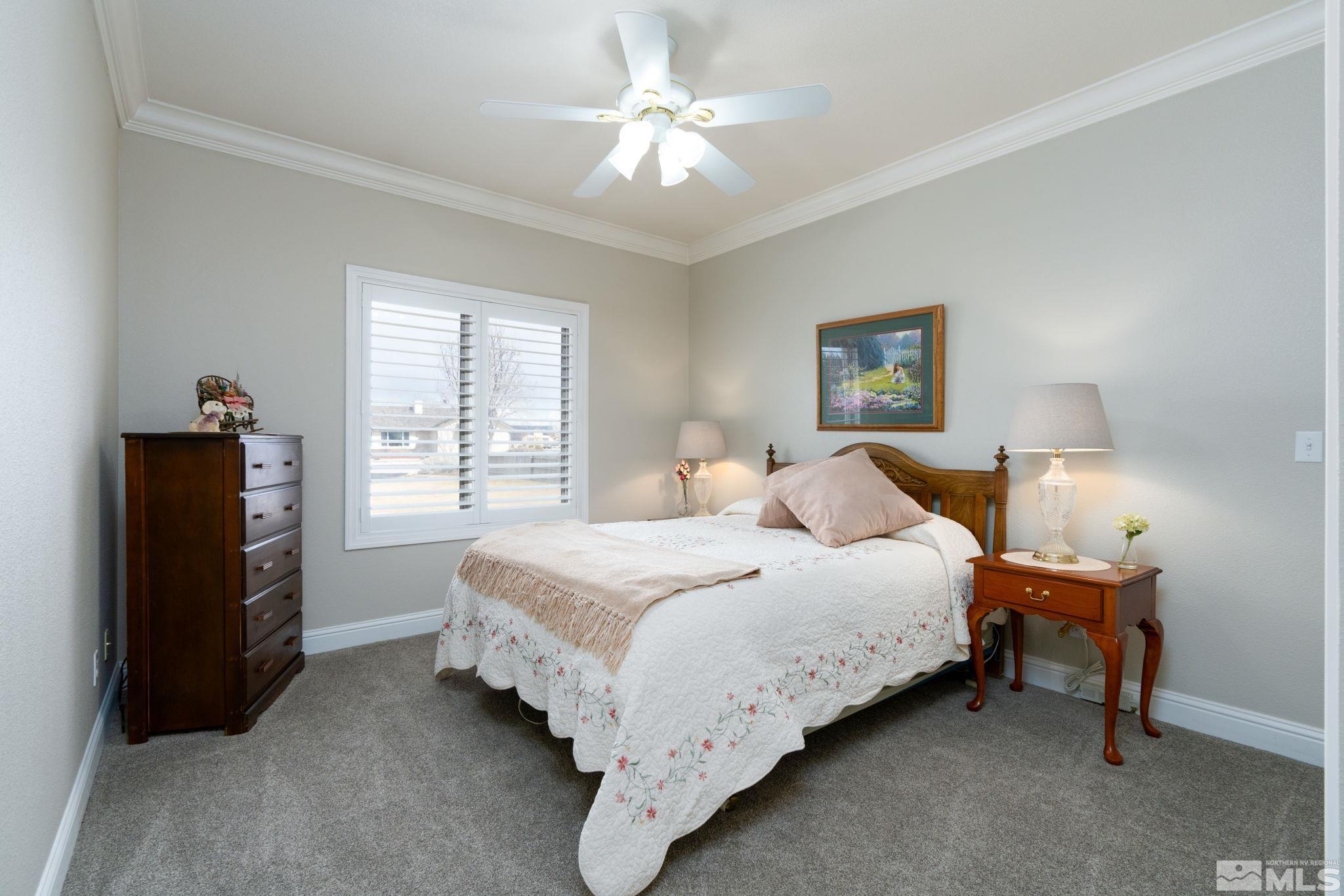 615 Carson River Drive Fallon, NV 89406 - Photo 22 of 40 a bedroom with bed and a tv