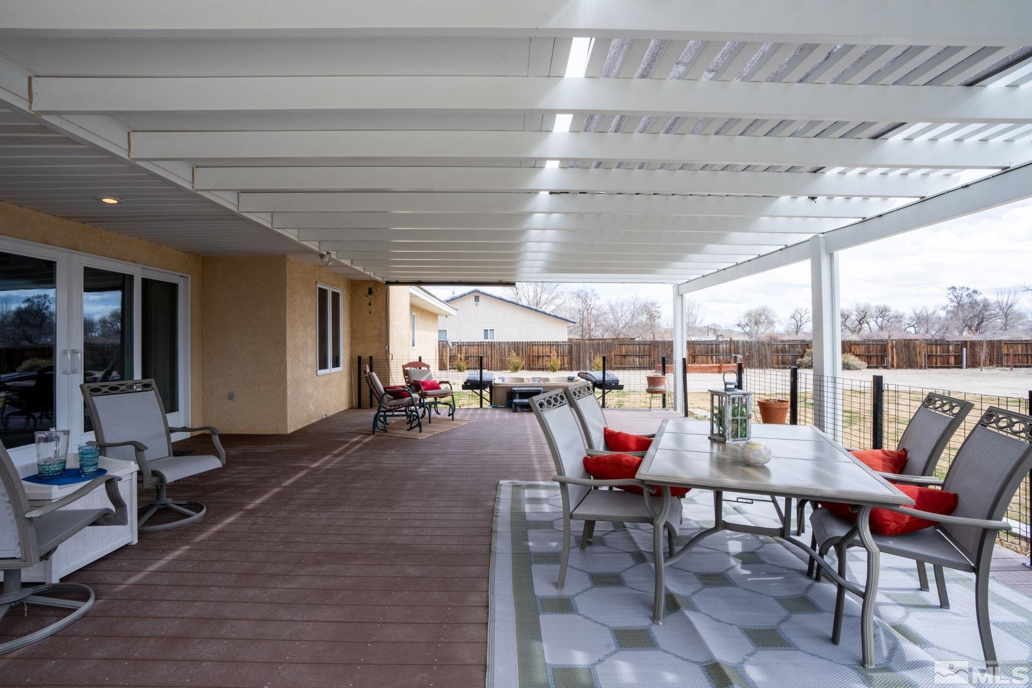 615 Carson River Drive Fallon, NV 89406 - Photo 30 of 40 a patio with patio table and chairs