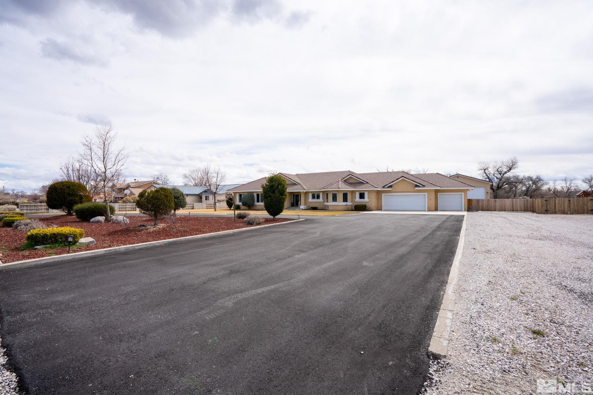 615 Carson River Drive Fallon, NV 89406 - Photo 3 of 40 a city view with a road