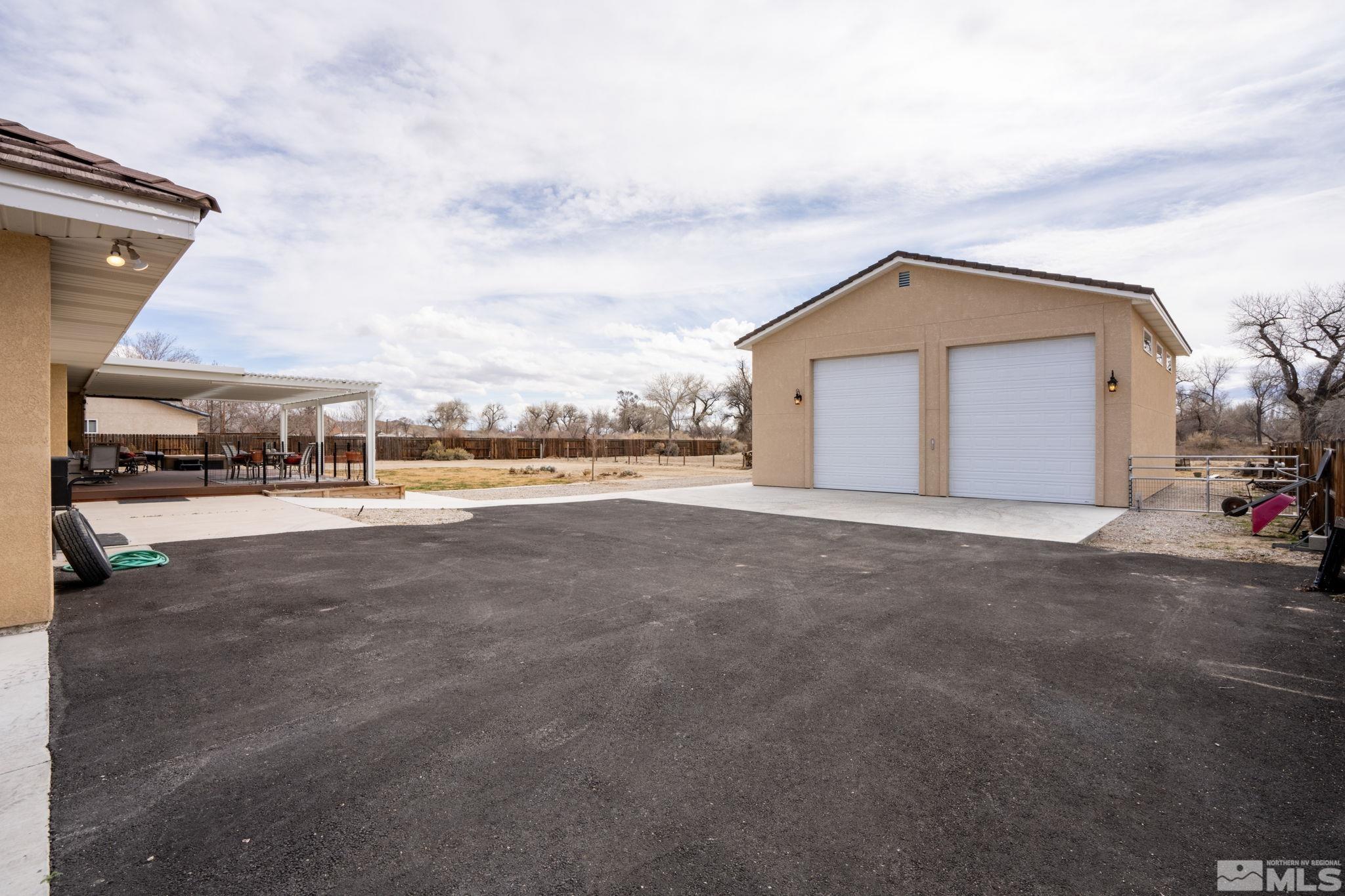 615 Carson River Drive Fallon, NV 89406 - Photo 33 of 40 a view of a city street with tall buildings