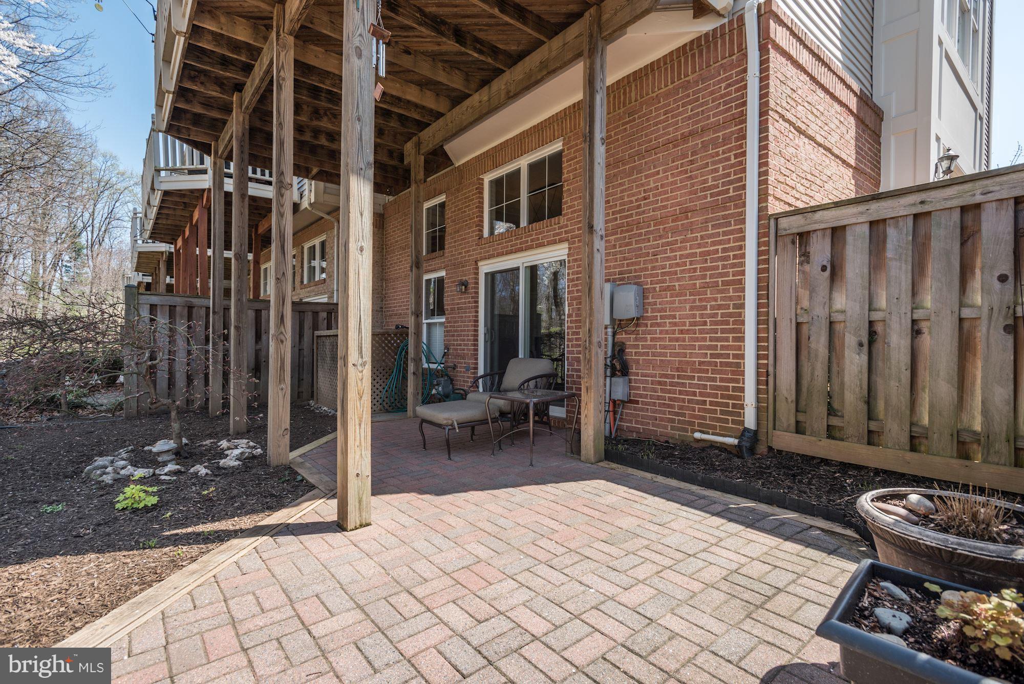 11492 Waterhaven Court Reston, VA 20190 - Photo 27 of 30 Exterior in Back Yard with Brick Patio