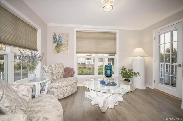 a living room with furniture and a table