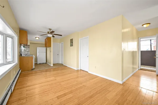 a view of a livingroom with a furniture and wooden floor