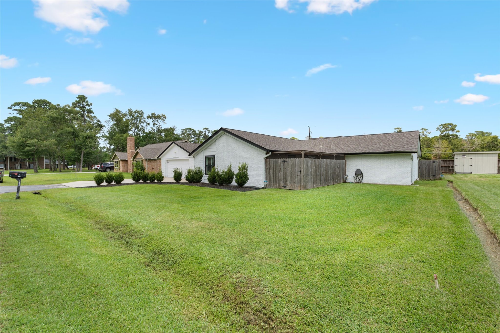 110 Dozent Lane Baytown, TX 77521 - Photo 2 of 36 a front view of house with garden