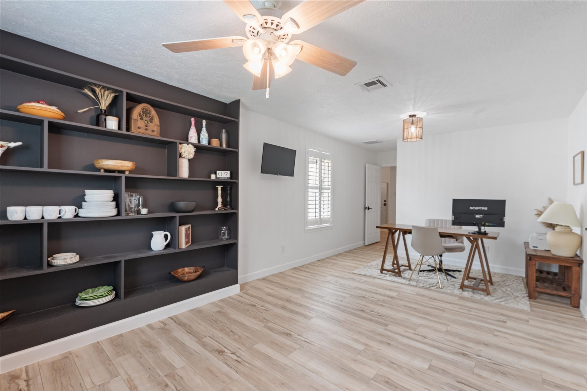 110 Dozent Lane Baytown, TX 77521 - Photo 20 of 36 a living room with furniture and a wooden floor