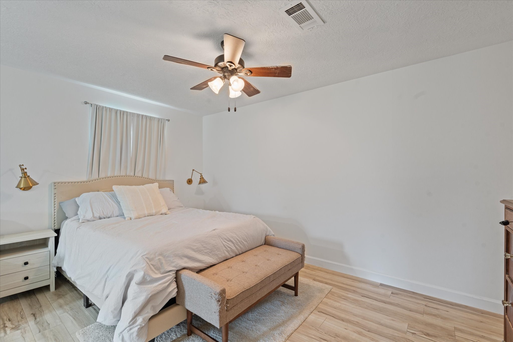 110 Dozent Lane Baytown, TX 77521 - Photo 24 of 36 a bedroom with a bed and wooden floor