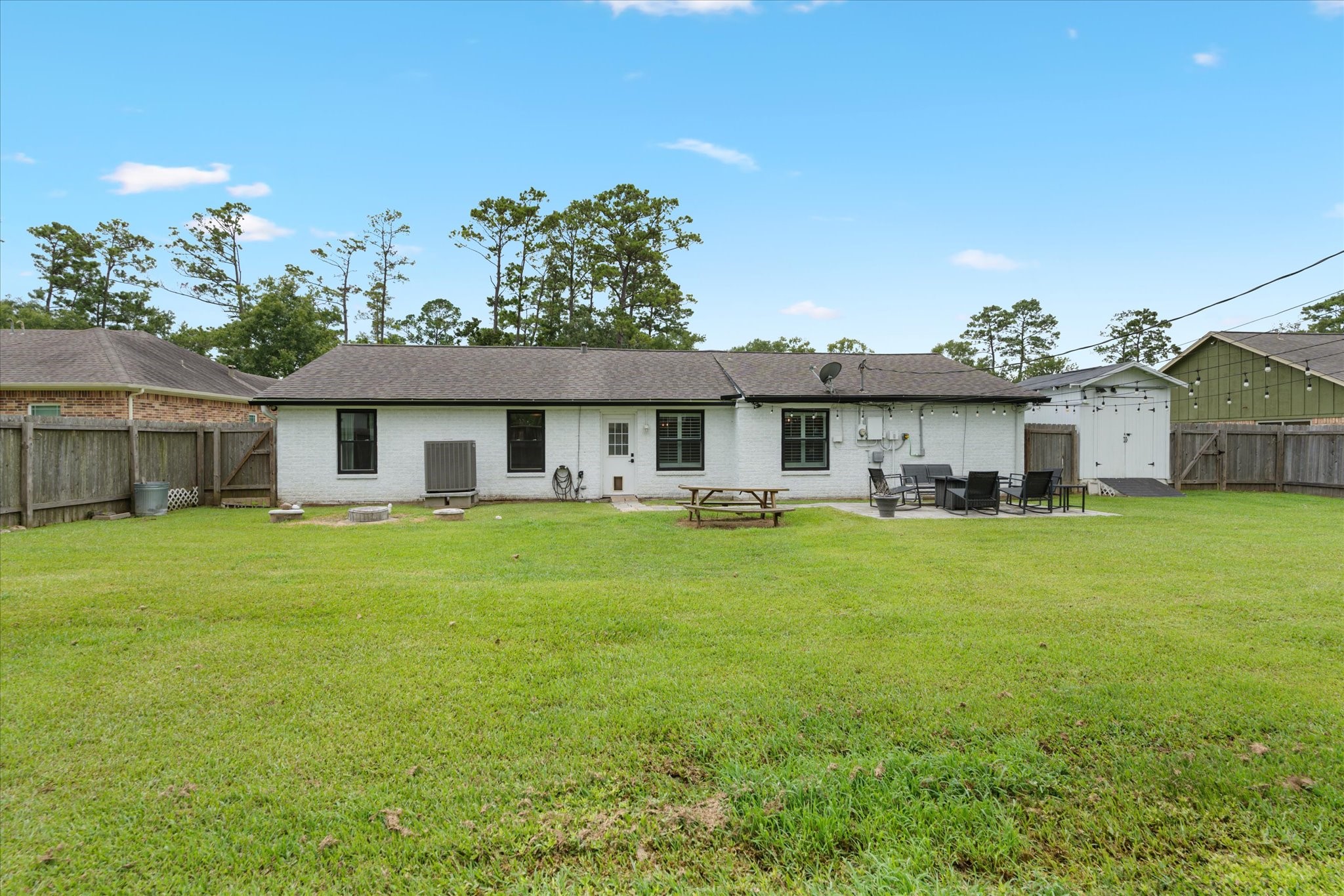 110 Dozent Lane Baytown, TX 77521 - Photo 27 of 36 a front view of a house with a garden