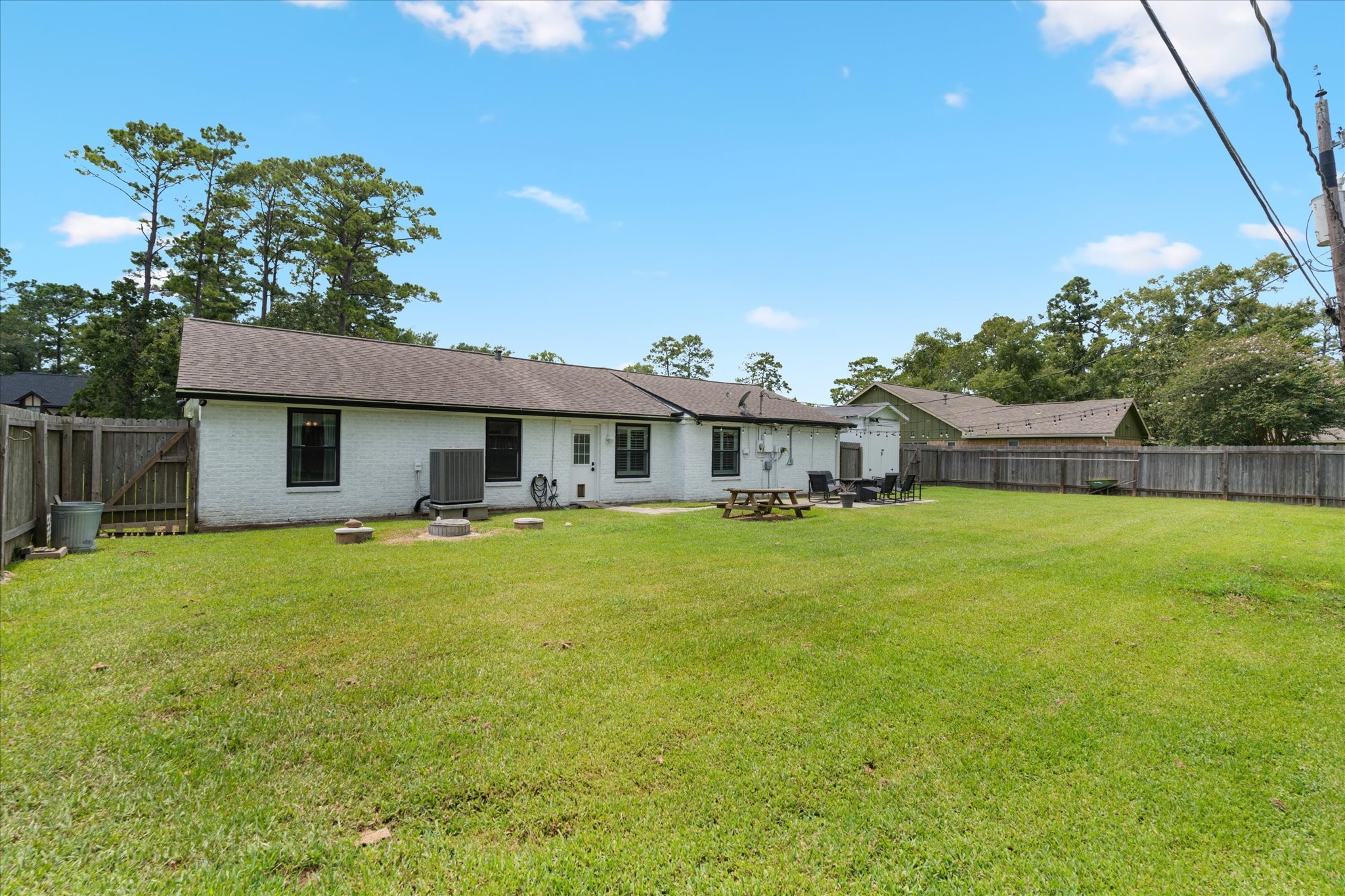 110 Dozent Lane Baytown, TX 77521 - Photo 28 of 36 a front view of a house with a garden and porch