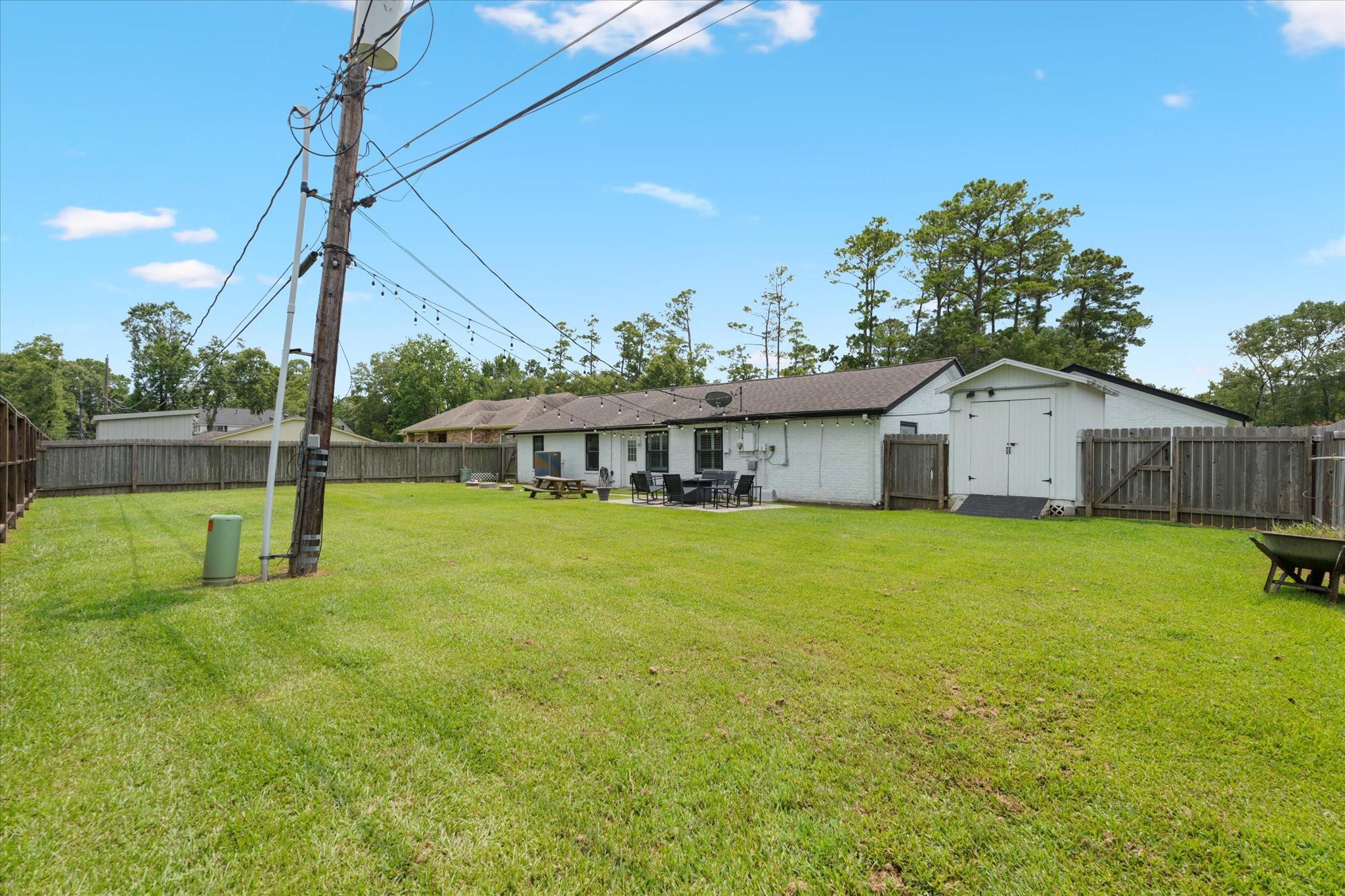110 Dozent Lane Baytown, TX 77521 - Photo 29 of 36 a front view of house with yard and seating area