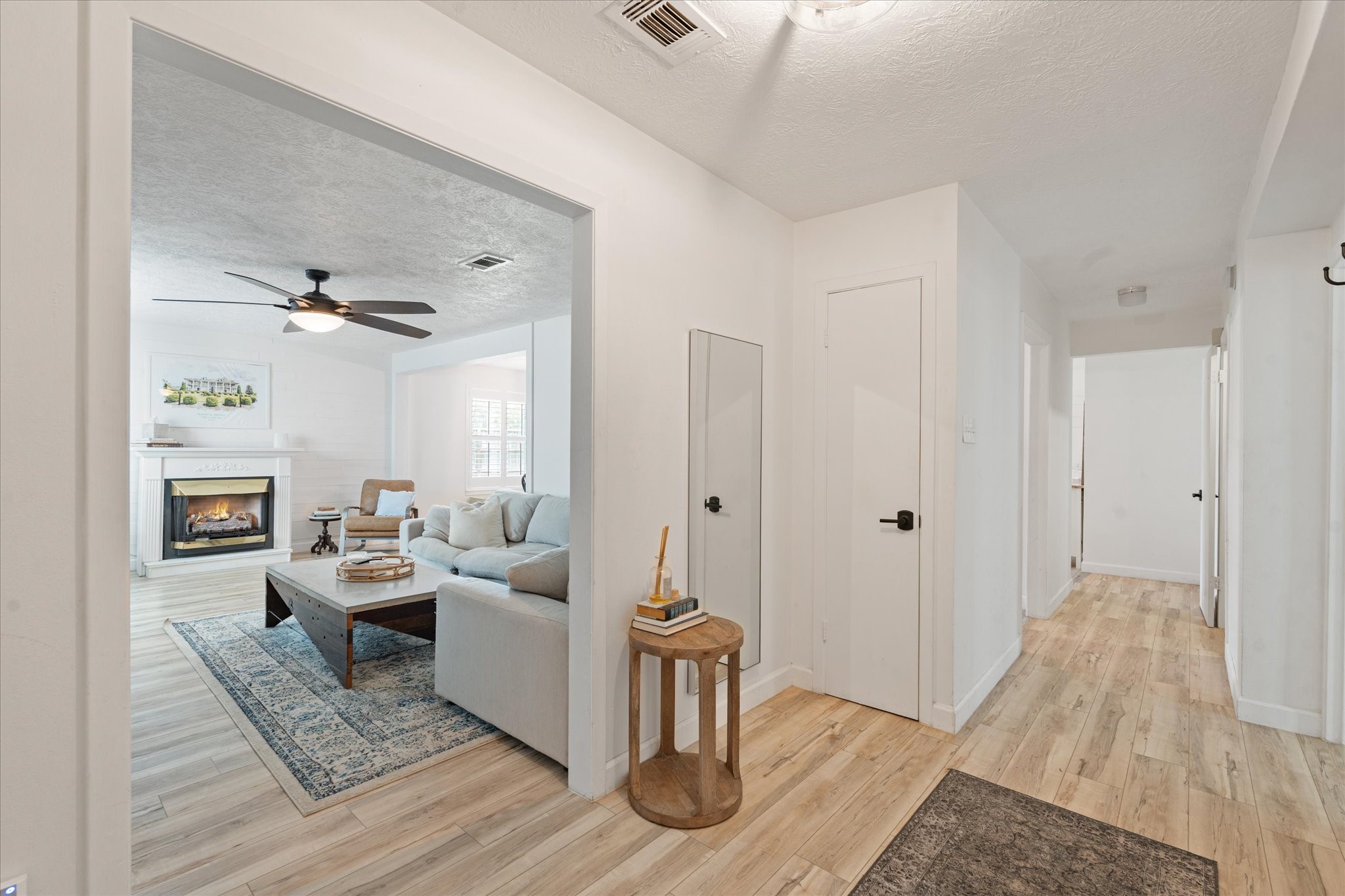 110 Dozent Lane Baytown, TX 77521 - Photo 5 of 36 a living room with furniture and a fireplace