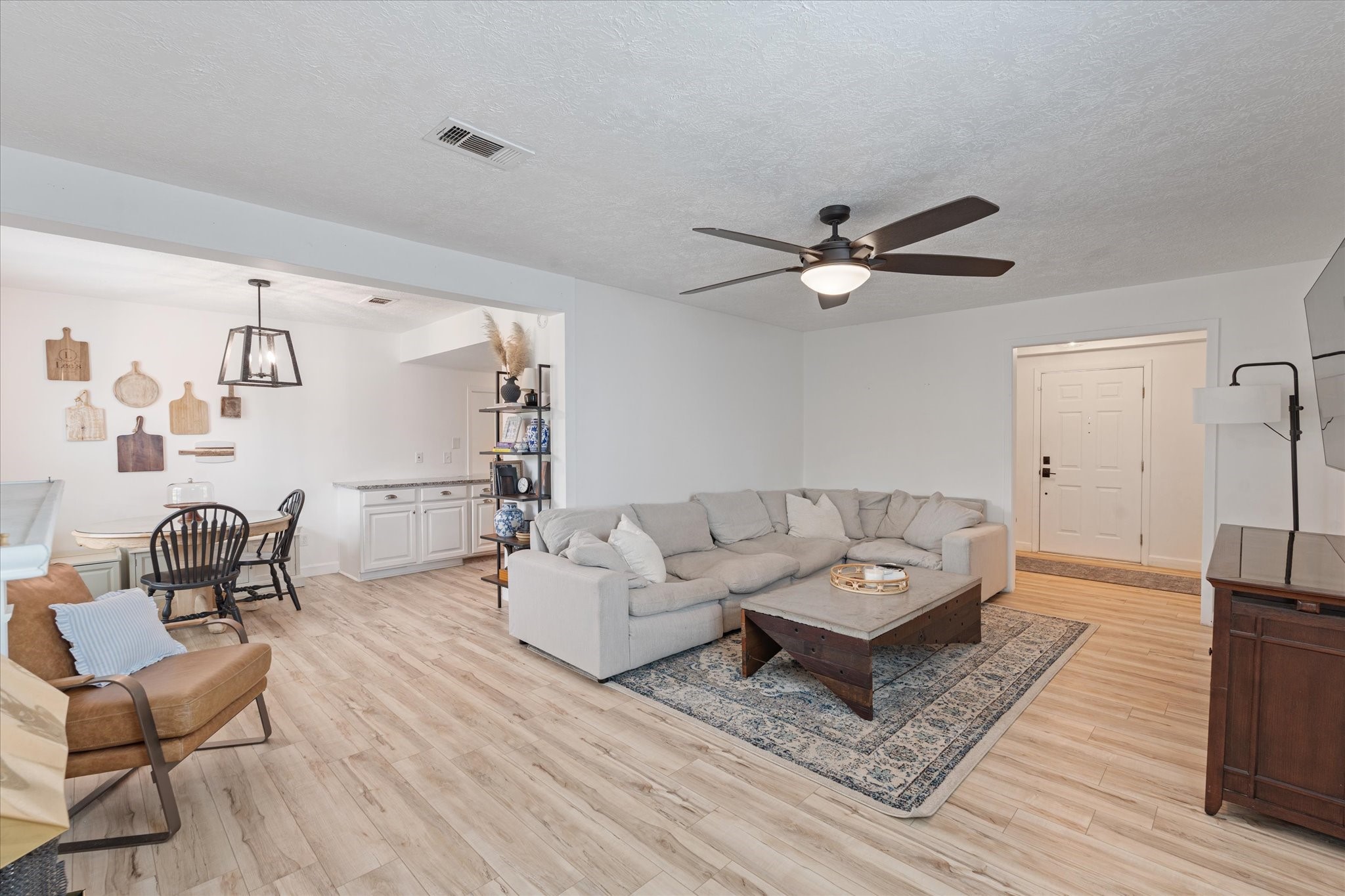 110 Dozent Lane Baytown, TX 77521 - Photo 7 of 36 a living room with furniture and a wooden floor