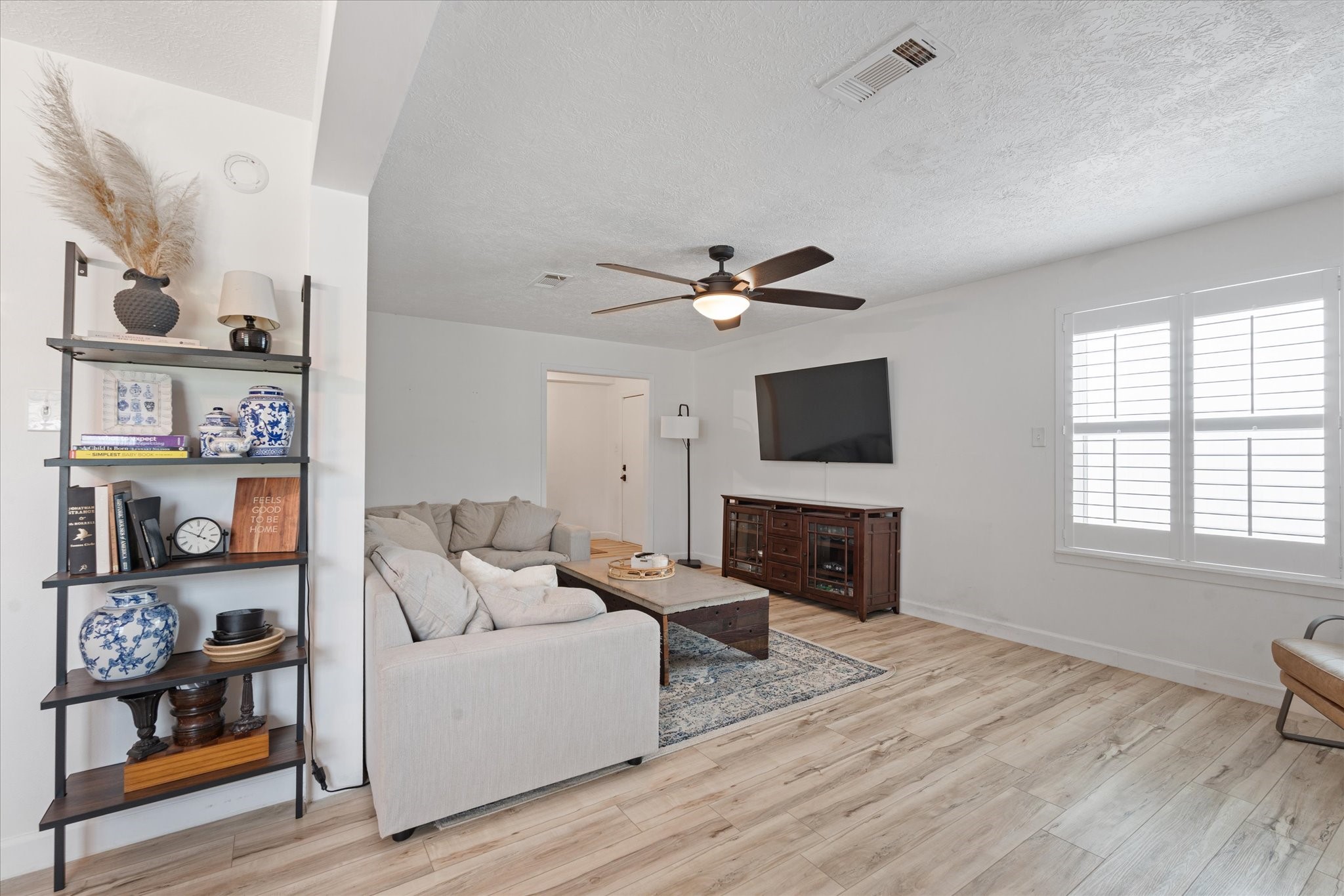 110 Dozent Lane Baytown, TX 77521 - Photo 8 of 36 a living room with furniture and a flat screen tv