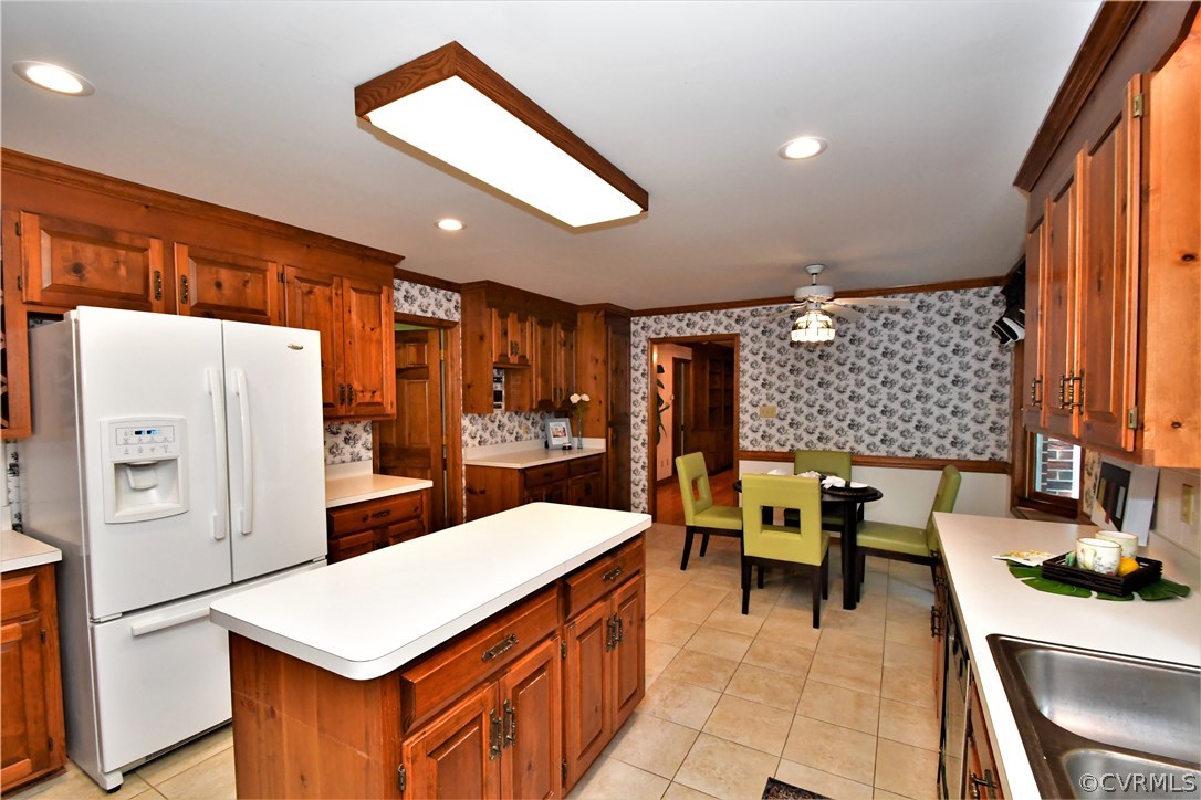 11101 Erin Road Chester, VA 23831 - Photo 14 of 46 a kitchen with stainless steel appliances kitchen island granite countertop a refrigerator and a stove