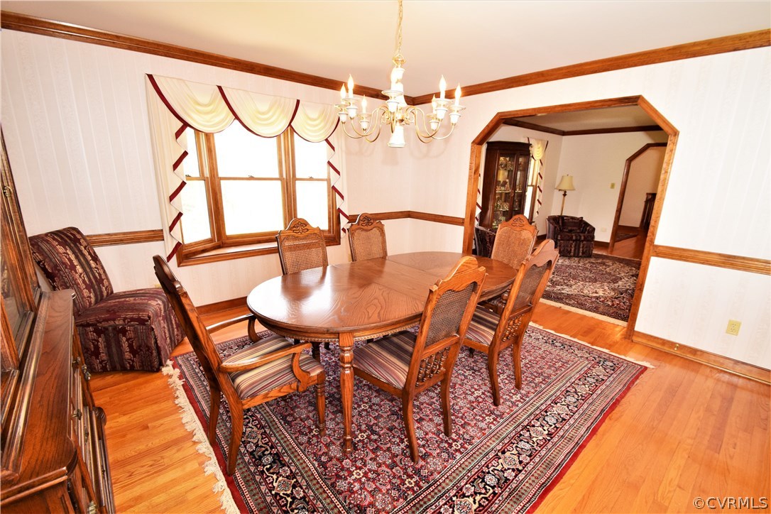 11101 Erin Road Chester, VA 23831 - Photo 17 of 46 a dining room with furniture and wooden floor