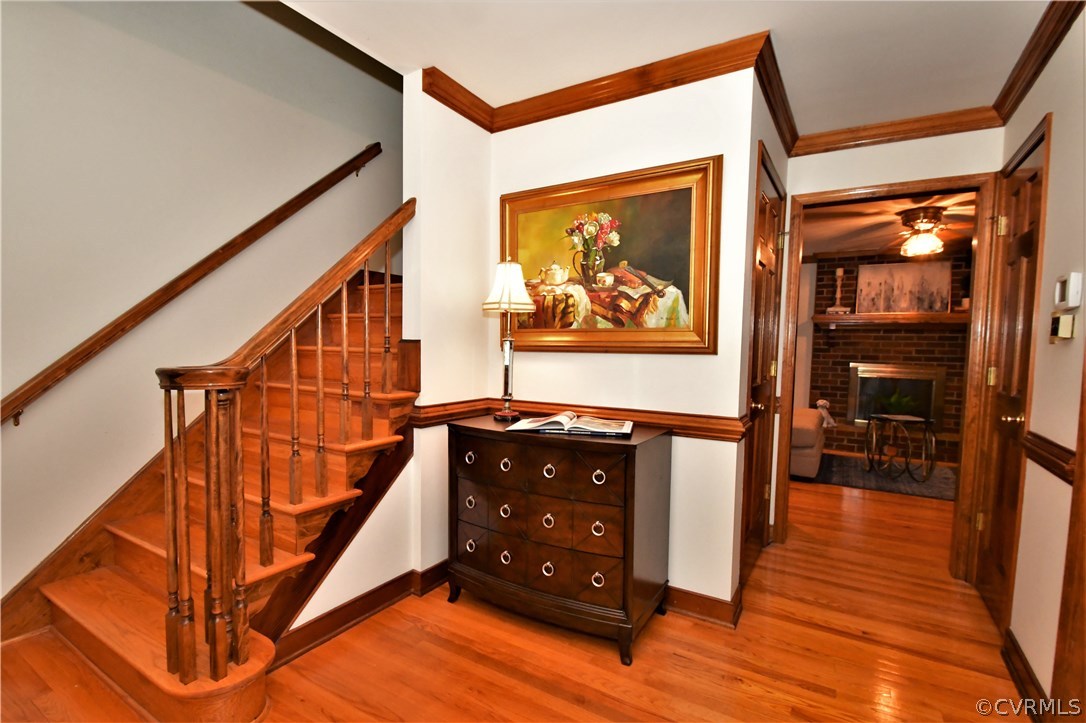 11101 Erin Road Chester, VA 23831 - Photo 3 of 46 a dinning room with wooden floor and stairs