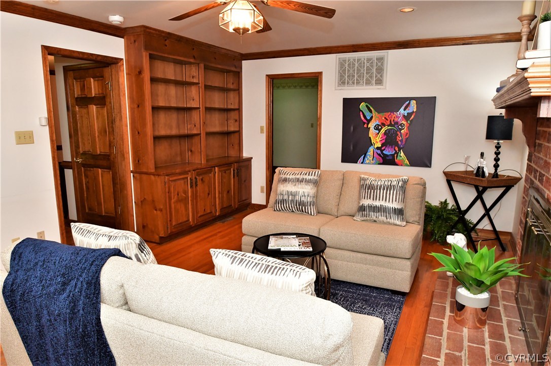 11101 Erin Road Chester, VA 23831 - Photo 4 of 46 a living room with furniture and a potted plant