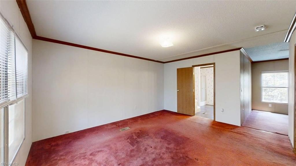 1080 Mineral Springs Road Madison, NC 27025 - Photo 18 of 26 Primary bedroom