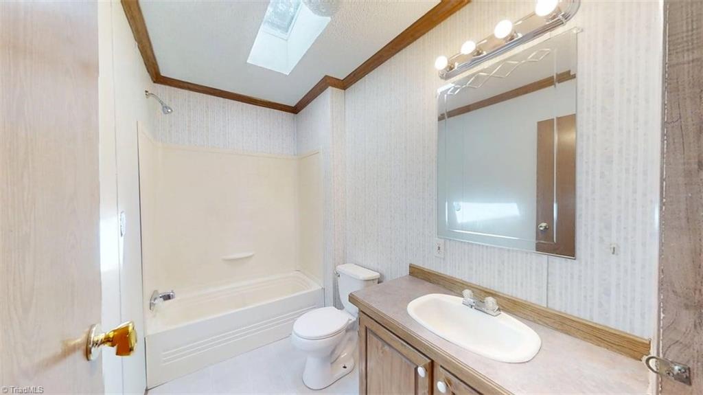 1080 Mineral Springs Road Madison, NC 27025 - Photo 25 of 26 Hall bathroom