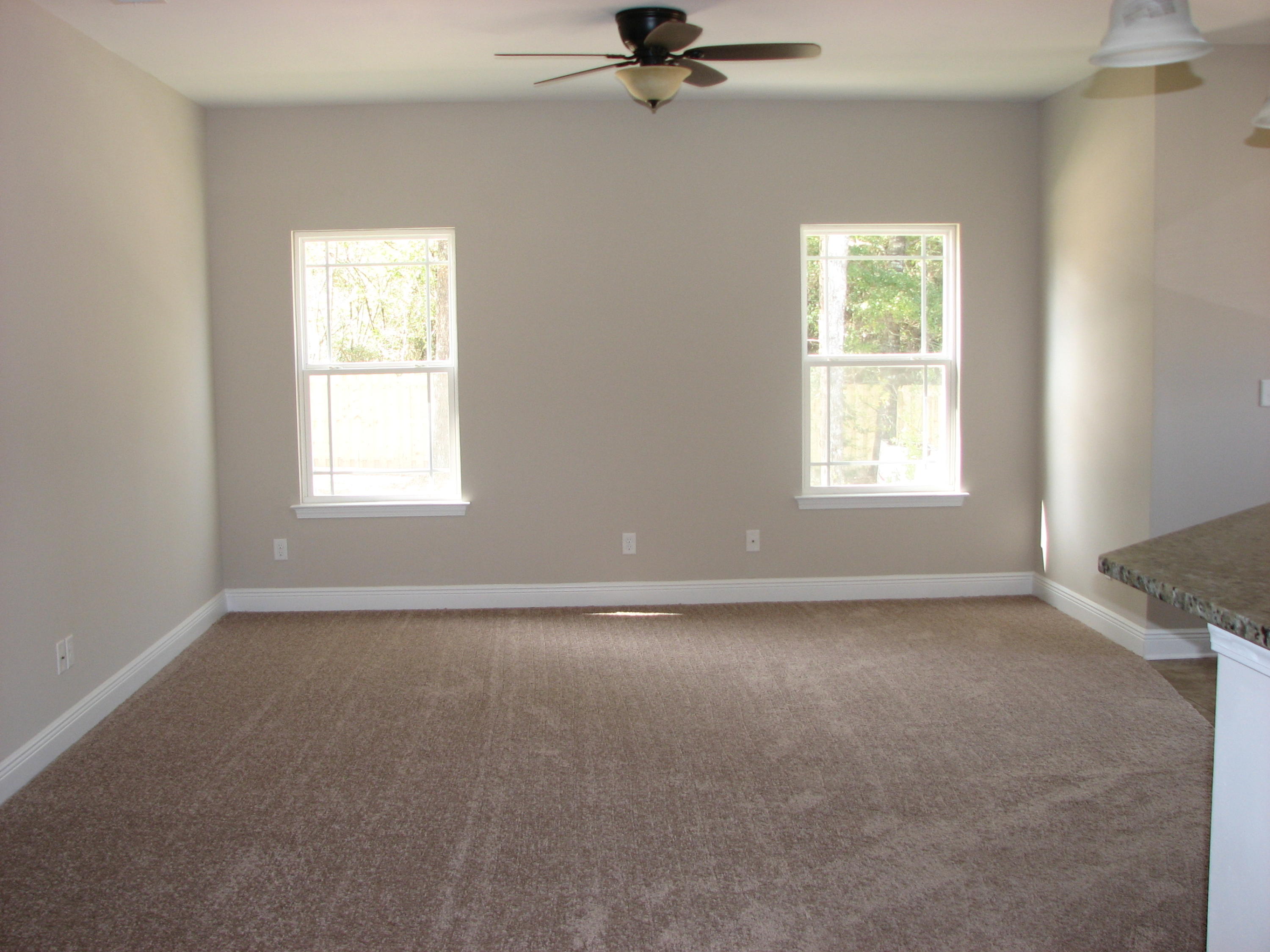 6020 Hidden Valley Road Crestview, FL 32539 - Photo 4 of 24 an empty room with a window