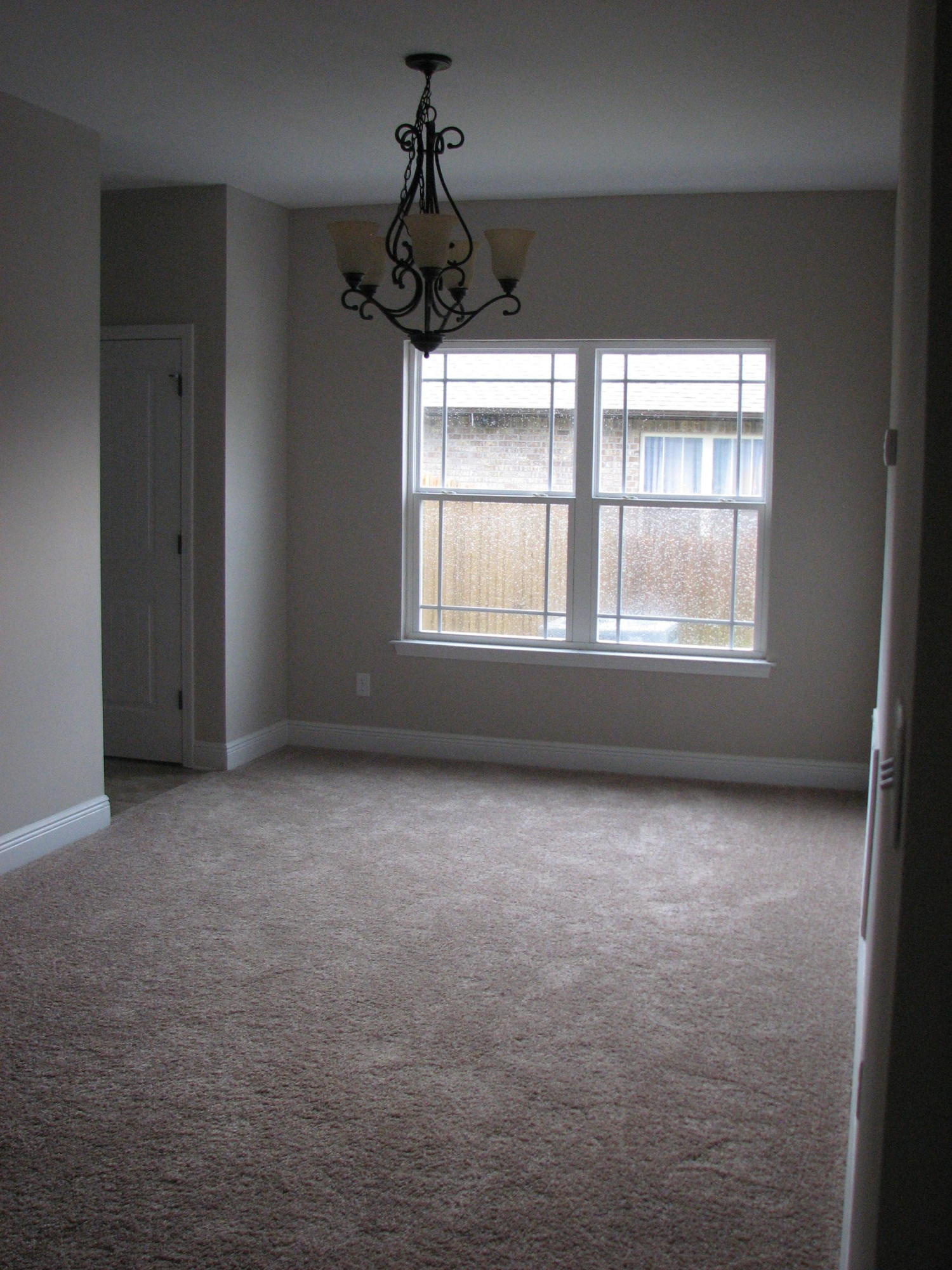 6020 Hidden Valley Road Crestview, FL 32539 - Photo 8 of 24 an empty room with a window
