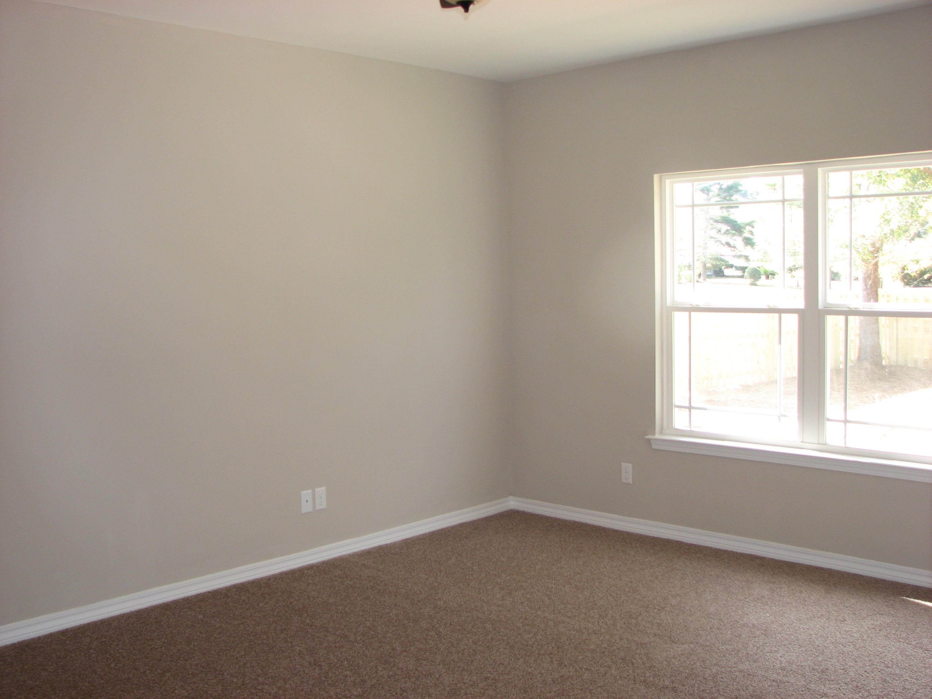 6020 Hidden Valley Road Crestview, FL 32539 - Photo 10 of 24 an empty room with a window