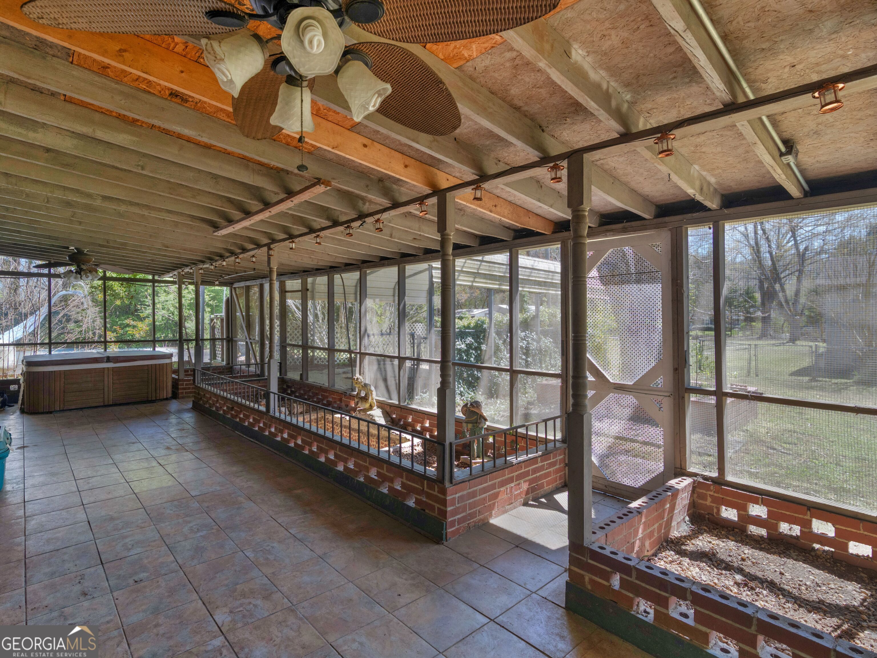 209 Founders Drive Barnesville, GA 30204 - Photo 13 of 80 a view of a room with wooden floor and iron stairs