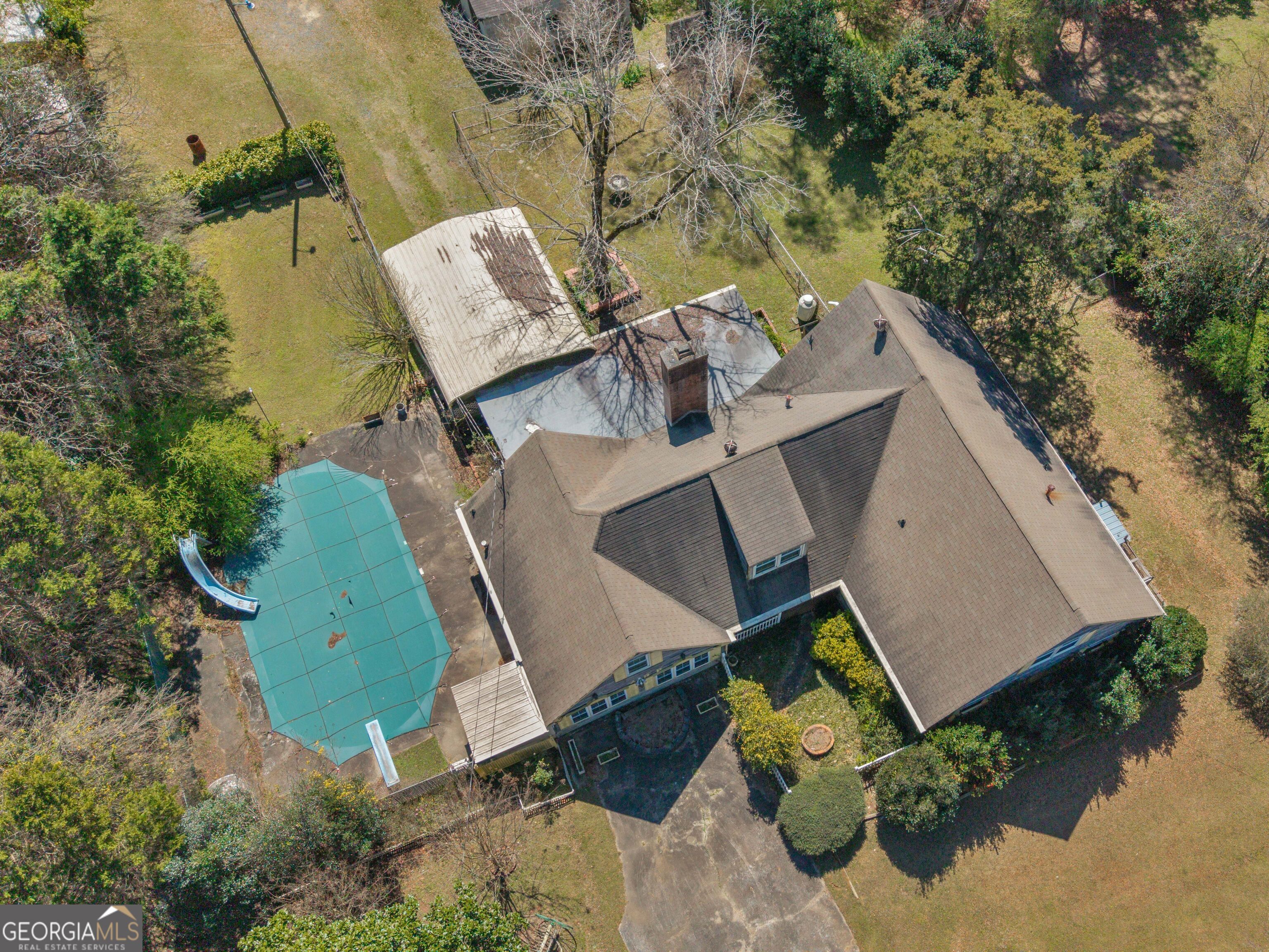 209 Founders Drive Barnesville, GA 30204 - Photo 3 of 80 an aerial view of a house with a swimming pool