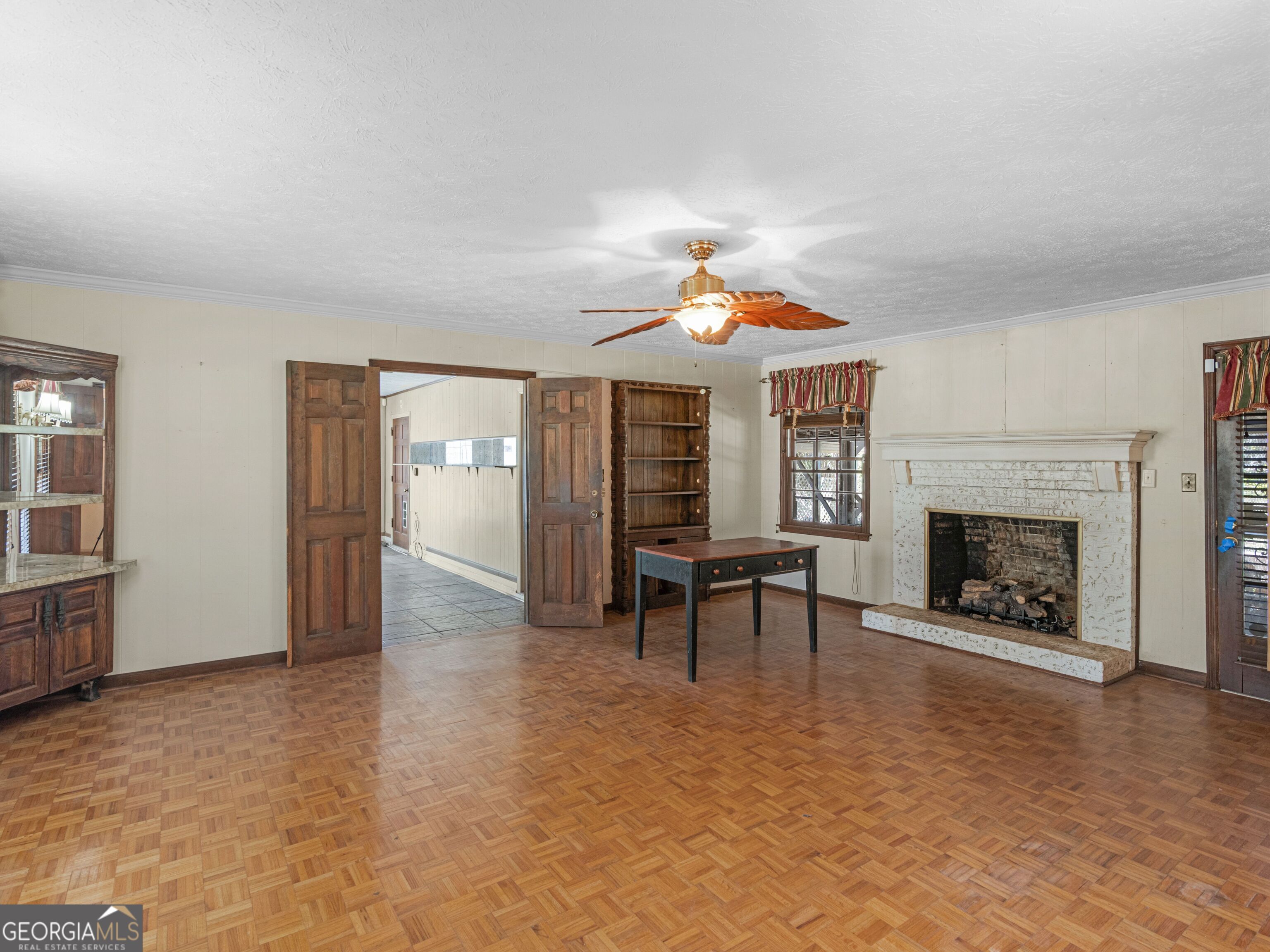 209 Founders Drive Barnesville, GA 30204 - Photo 38 of 80 an empty room with furniture and a fireplace