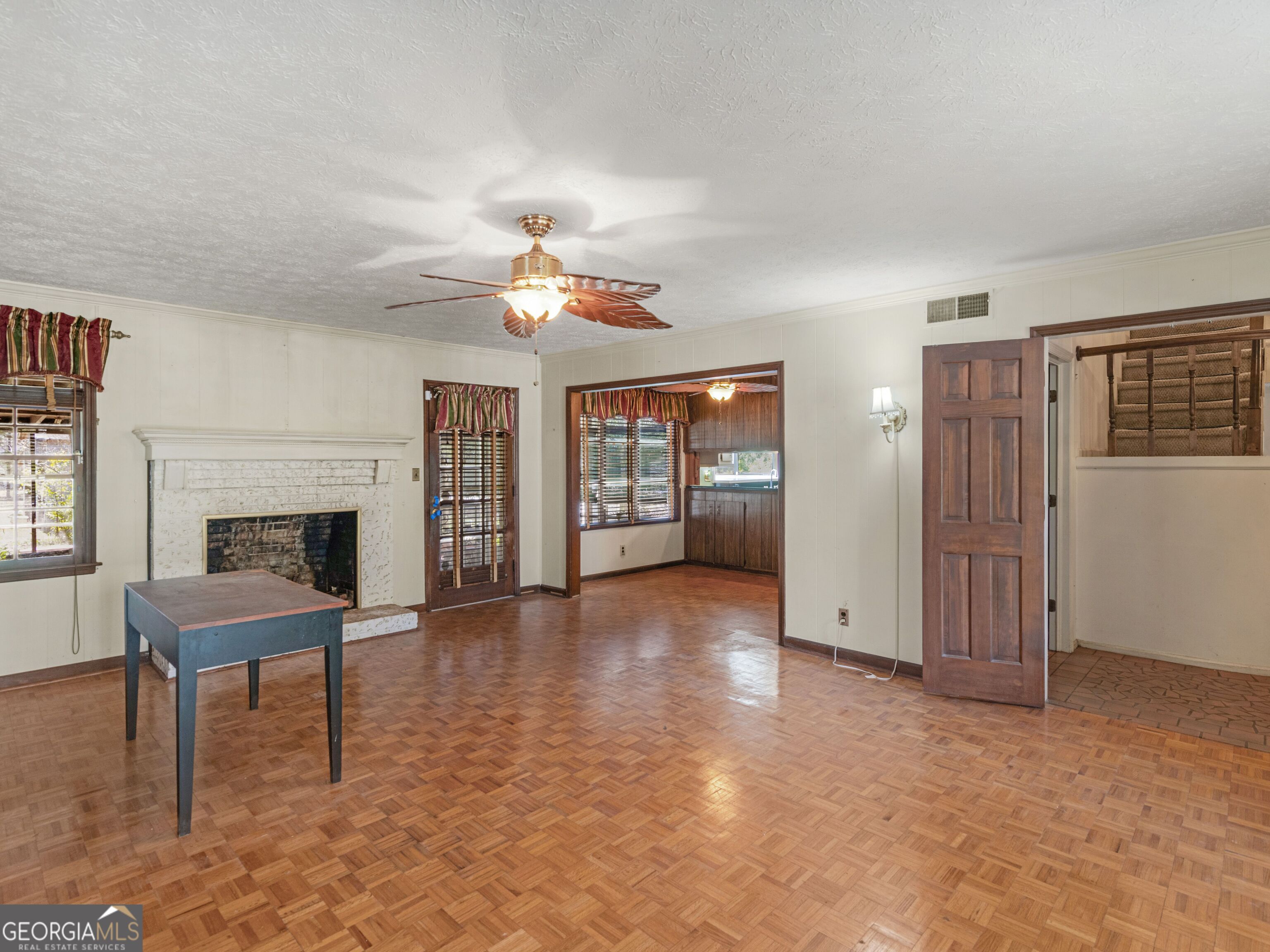 209 Founders Drive Barnesville, GA 30204 - Photo 41 of 80 a view of an empty room with a fireplace and a window