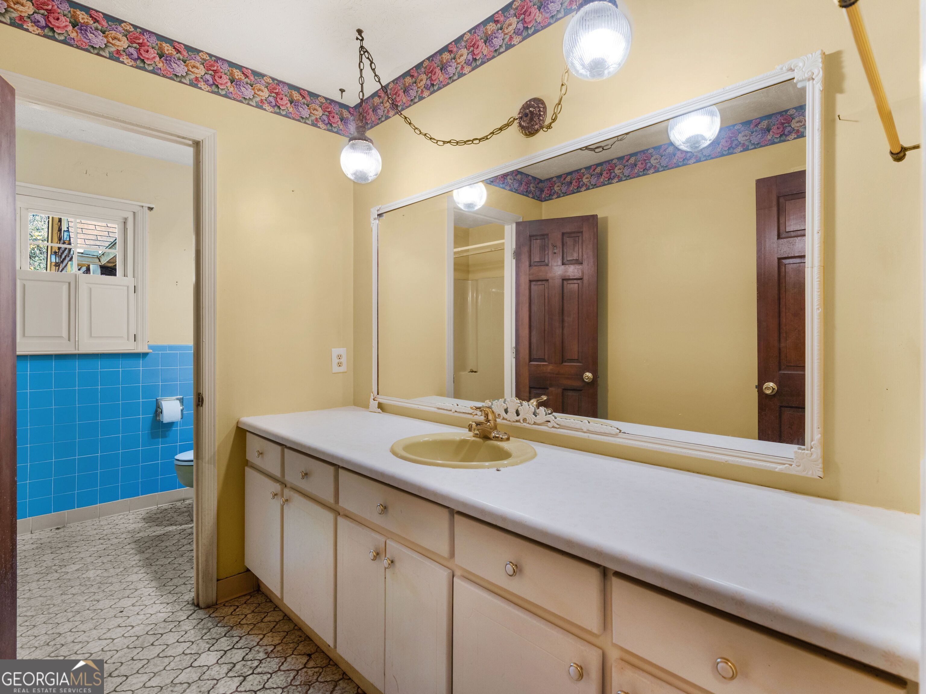 209 Founders Drive Barnesville, GA 30204 - Photo 48 of 80 a bathroom with a sink and a mirror