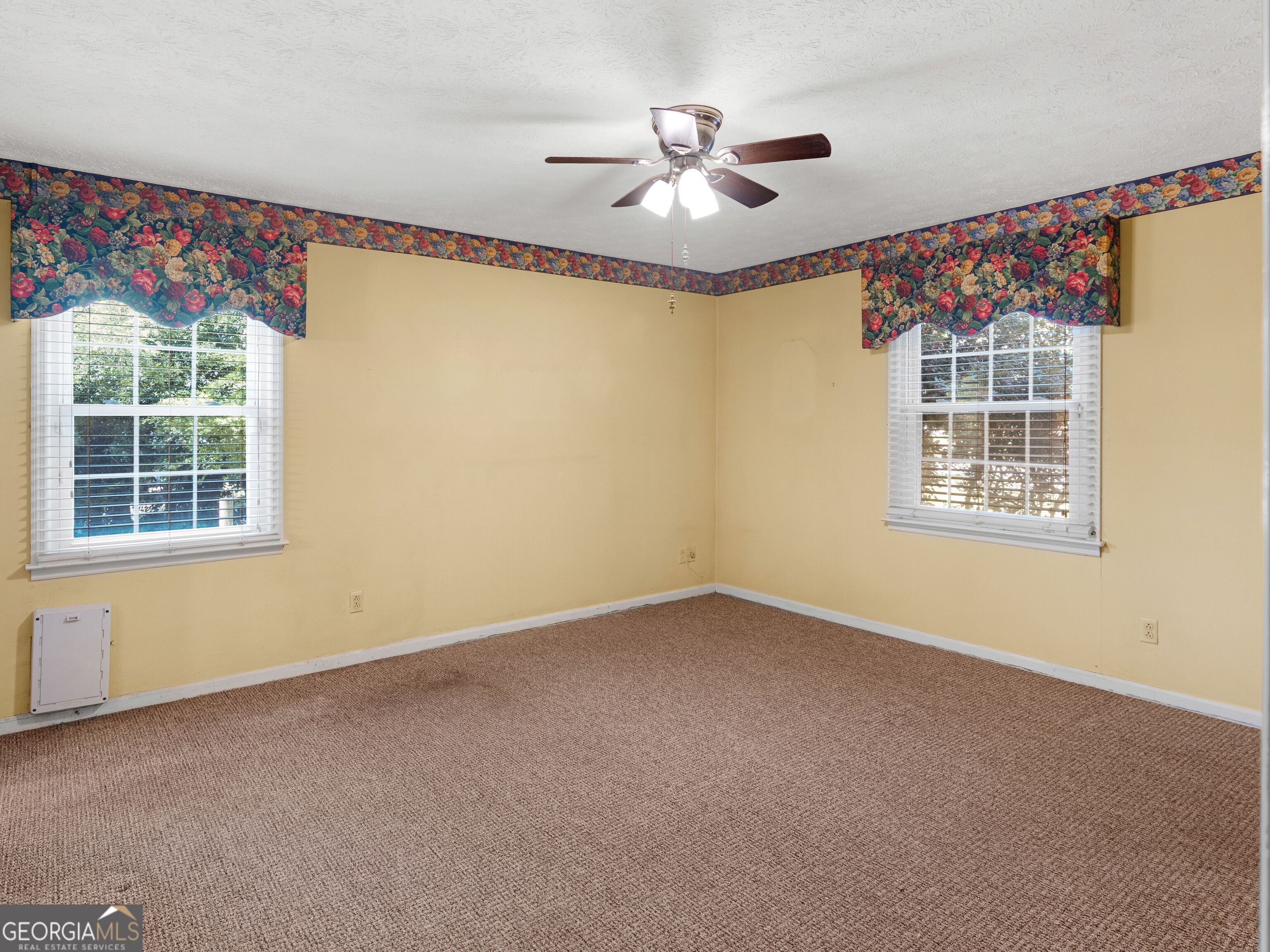 209 Founders Drive Barnesville, GA 30204 - Photo 54 of 80 a view of an empty room with a window