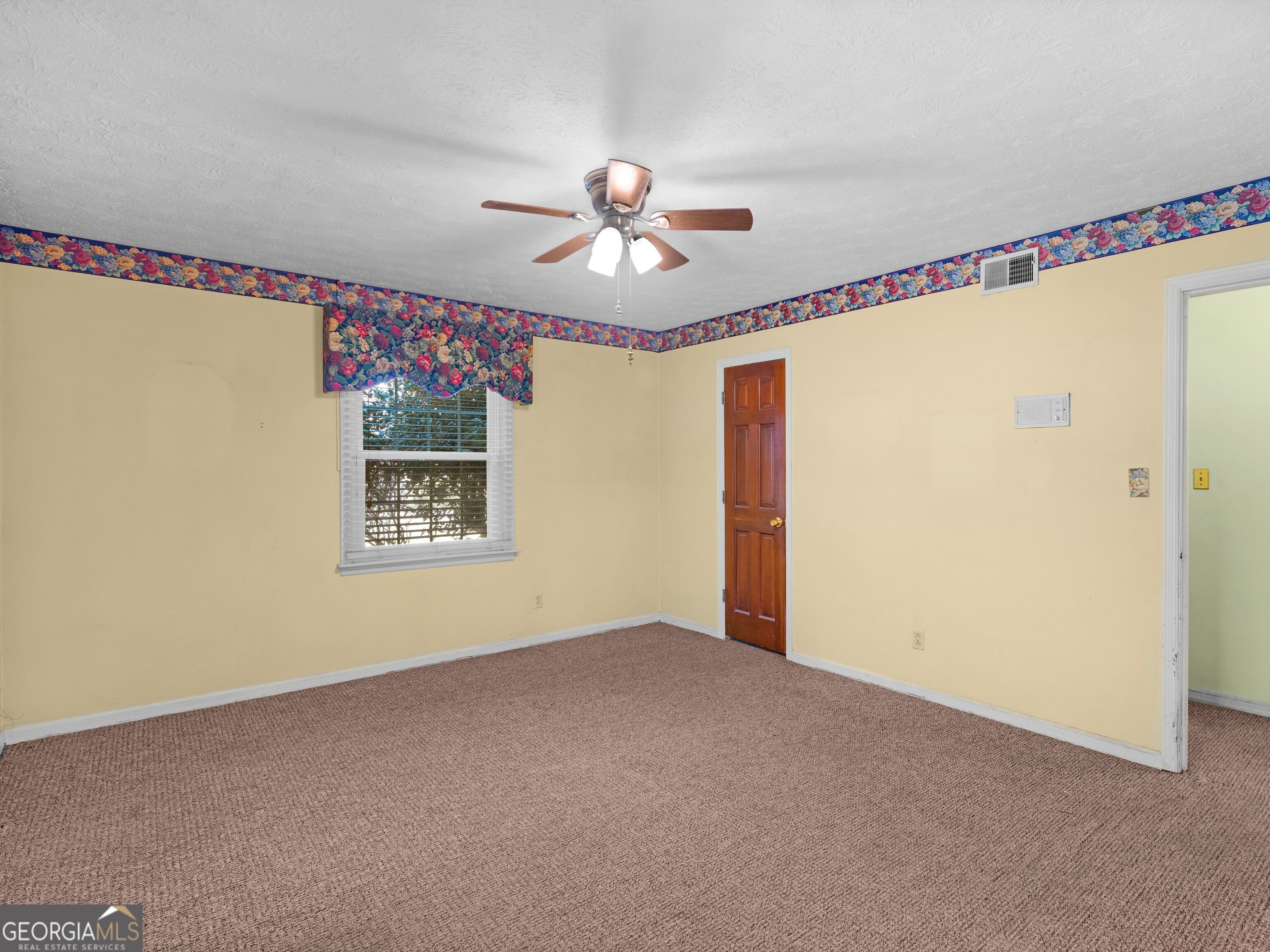 209 Founders Drive Barnesville, GA 30204 - Photo 57 of 80 a view of an empty room with a window