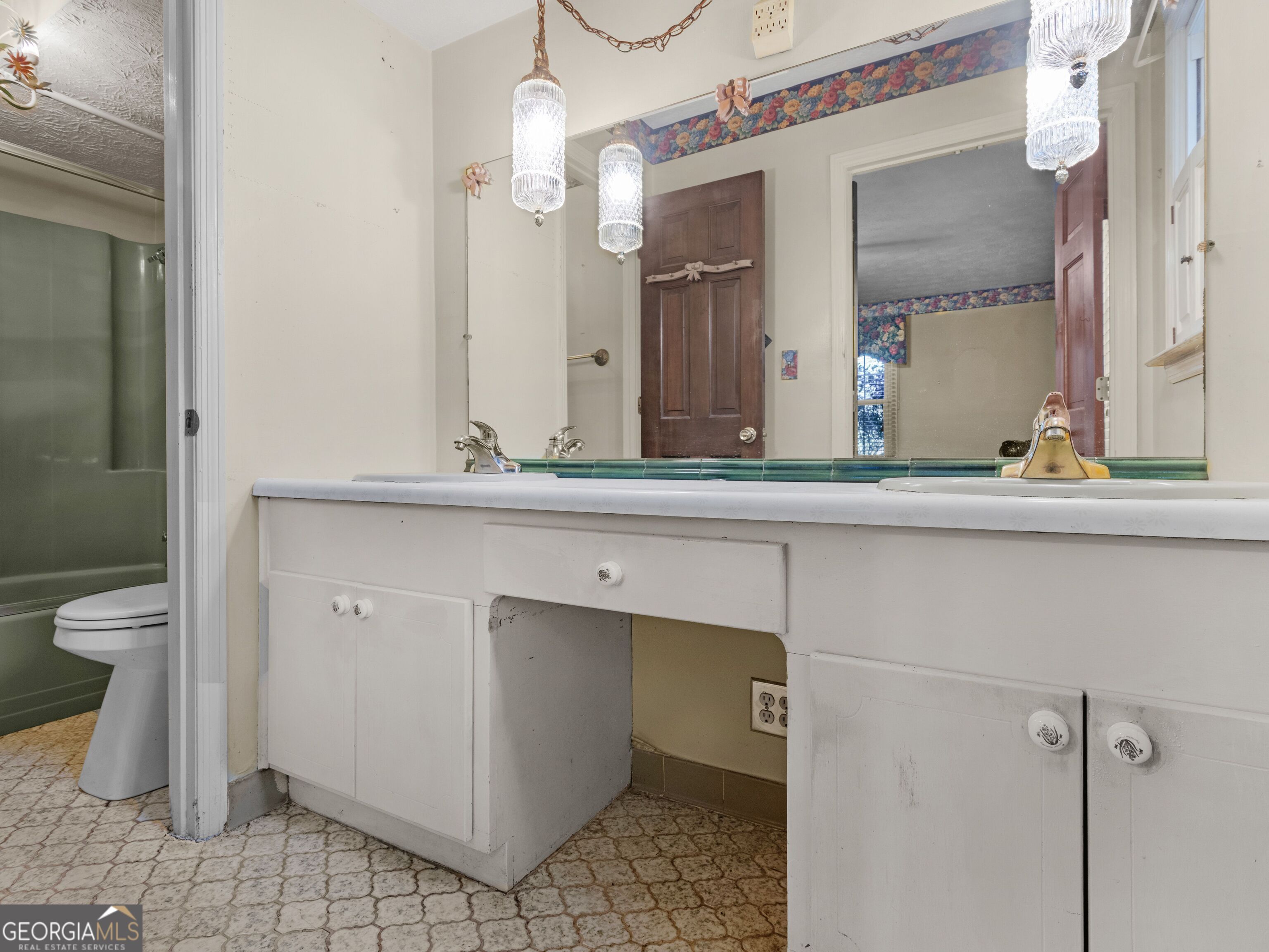 209 Founders Drive Barnesville, GA 30204 - Photo 58 of 80 a bathroom with a sink and a mirror