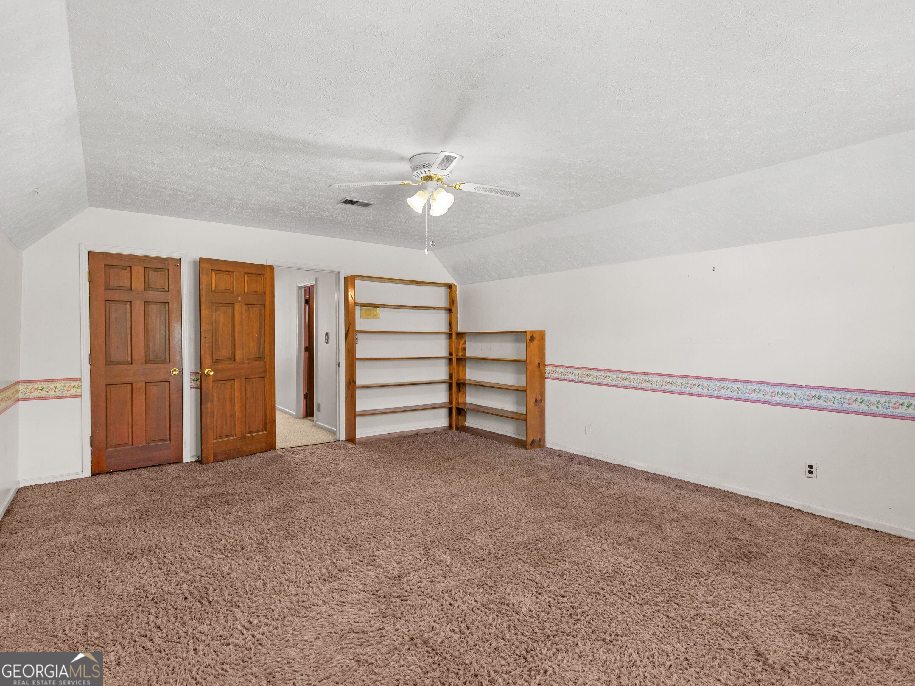 209 Founders Drive Barnesville, GA 30204 - Photo 64 of 80 a view of empty room with ceiling fan
