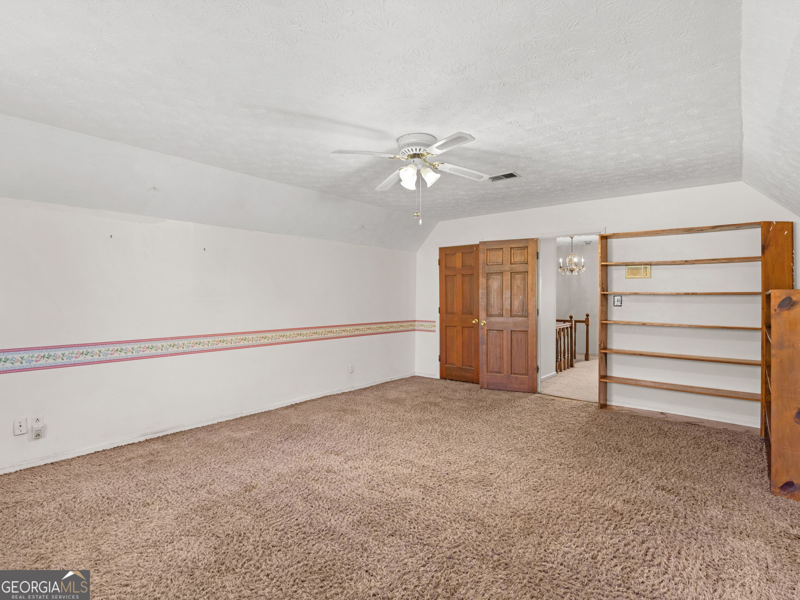 209 Founders Drive Barnesville, GA 30204 - Photo 65 of 80 a view of an empty room with a ceiling fan