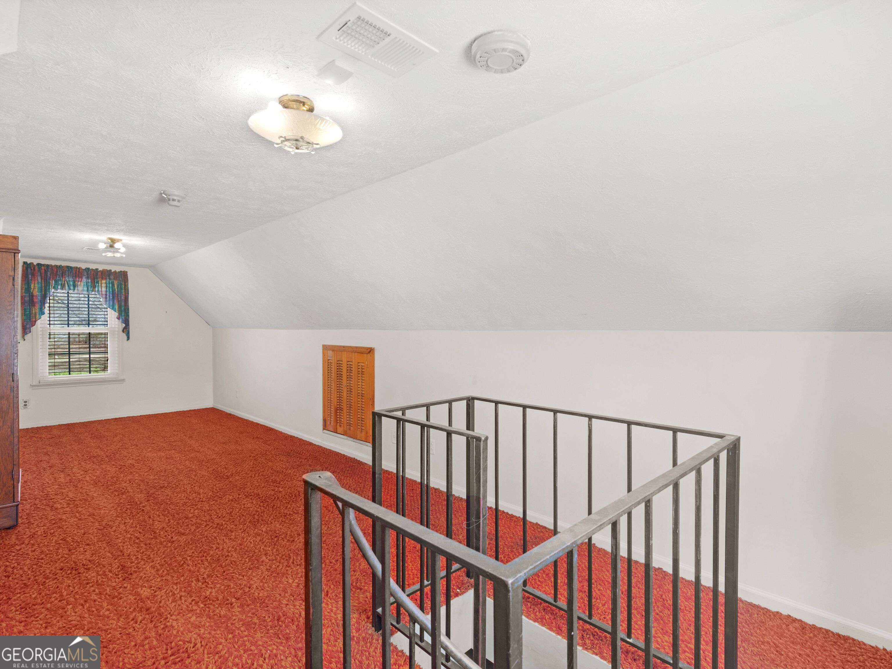 209 Founders Drive Barnesville, GA 30204 - Photo 79 of 80 a view of staircase with white walls