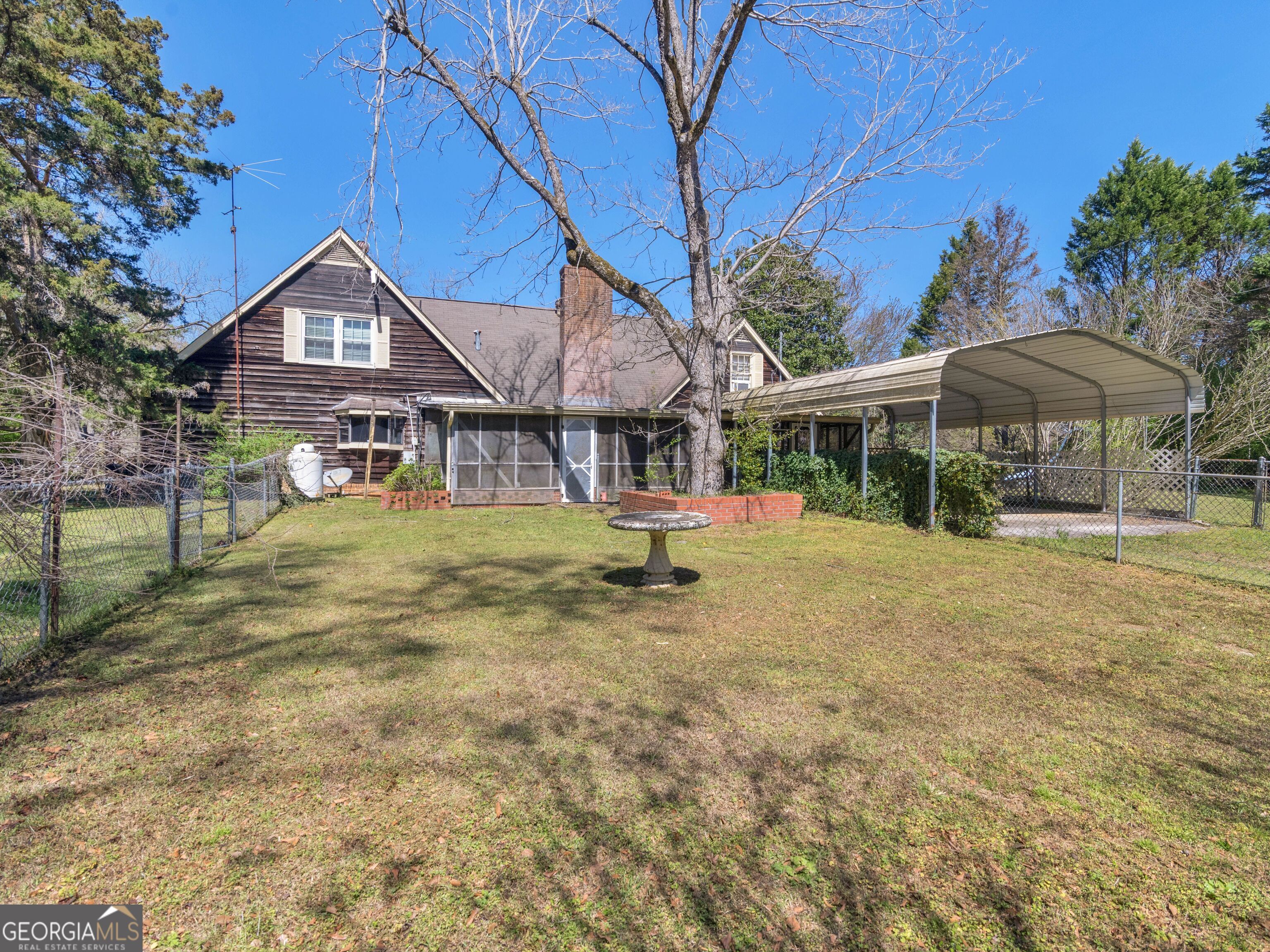 209 Founders Drive Barnesville, GA 30204 - Photo 10 of 80 a house with garden in front of it