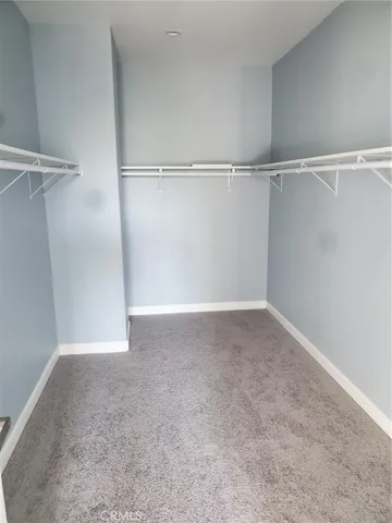 a bathroom with a bathtub and a toilet