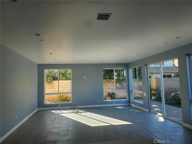a kitchen with a sink cabinets and stainless steel appliances
