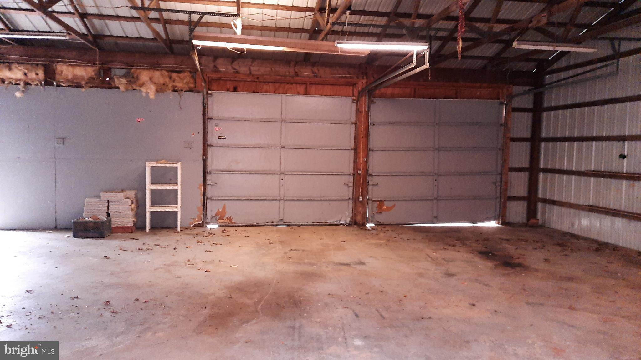21051 Seigen Lane Richardsville, VA 22736 - Photo 35 of 42 a view of an empty room with storage