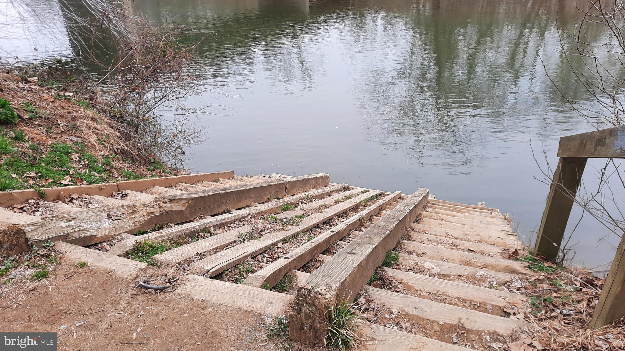 21051 Seigen Lane Richardsville, VA 22736 - Photo 42 of 42 a view of a wooden floor and a lake view